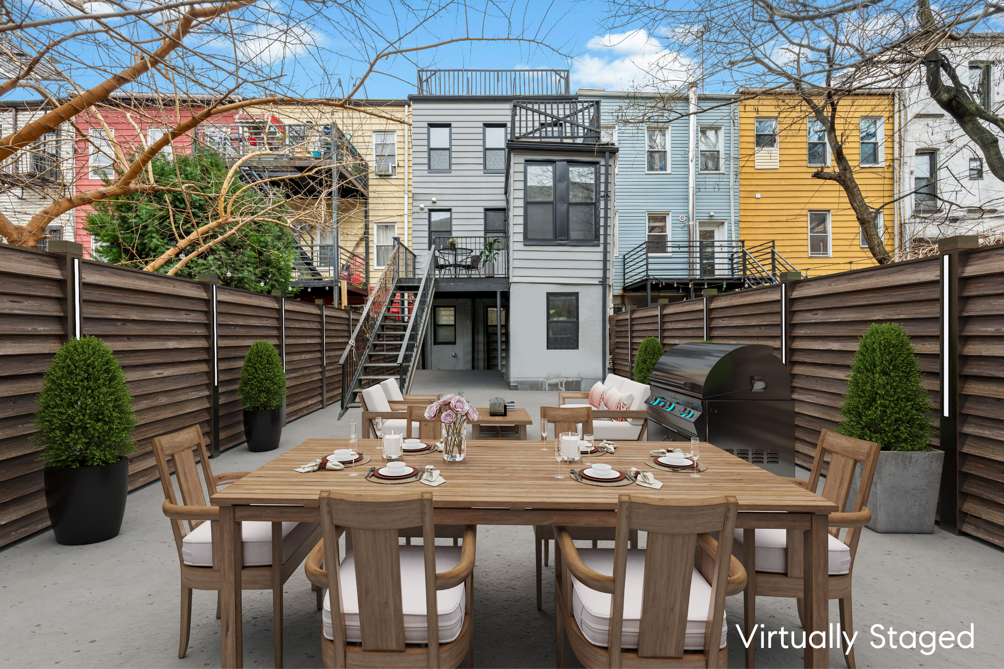 181 Park Avenue Brooklyn, NY 11205 - Photo 17 of 19 a view of an outside dining space with a table and chairs