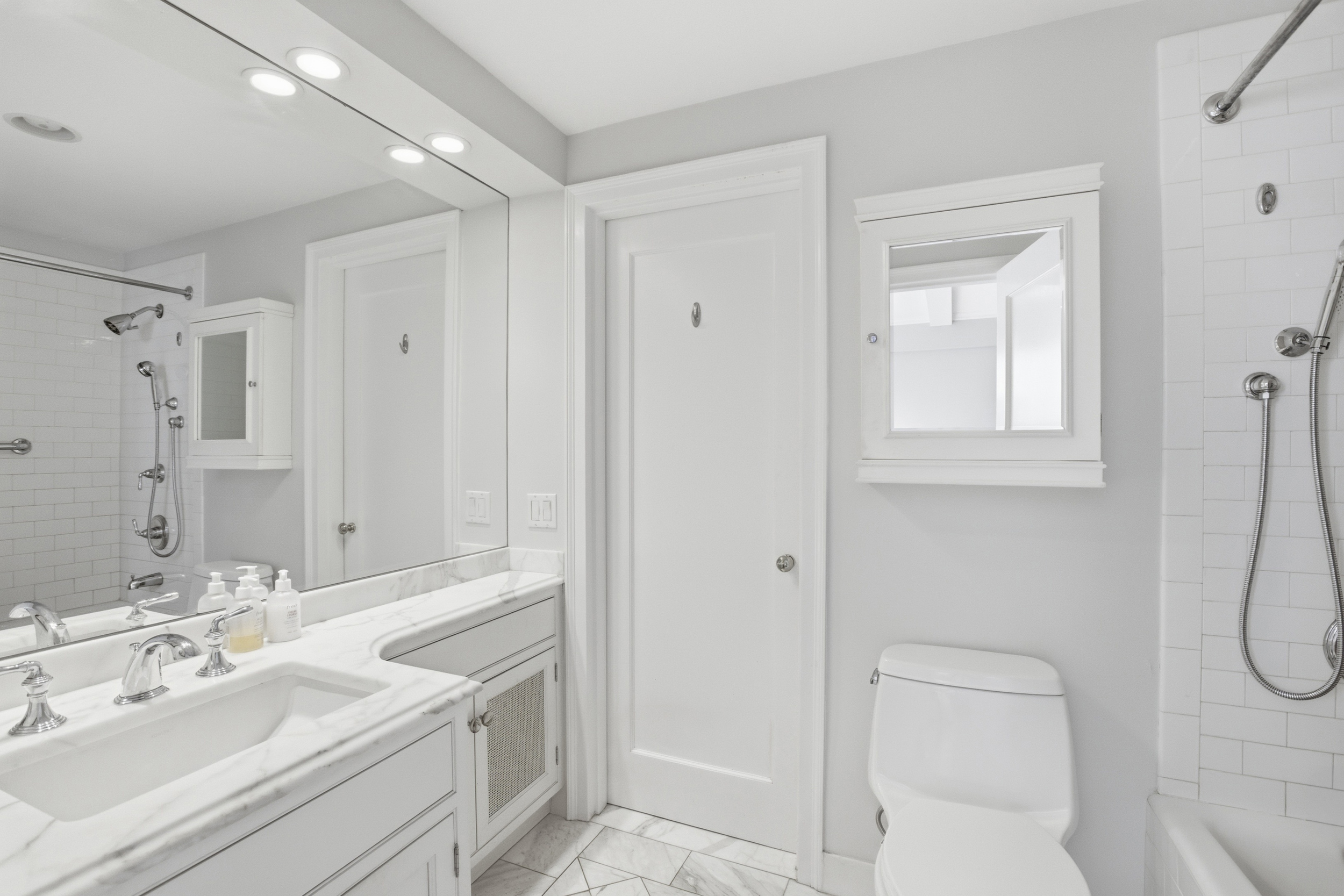 60 Gramercy Park North, Unit 8D Manhattan, NY 10010 - Photo 11 of 14 a bathroom with a sink a toilet and shower
