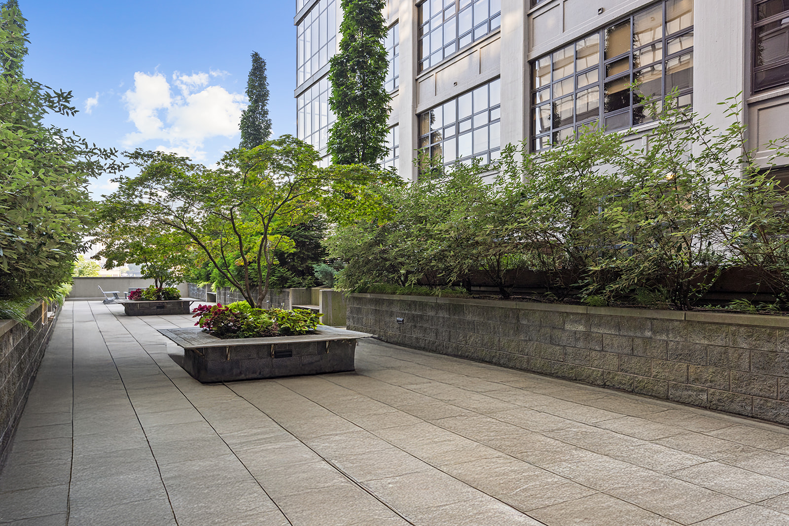 360 Furman Street, Unit 322/323 Brooklyn, NY 11201 - Photo 22 of 42 a view of a patio with couches and a potted plant