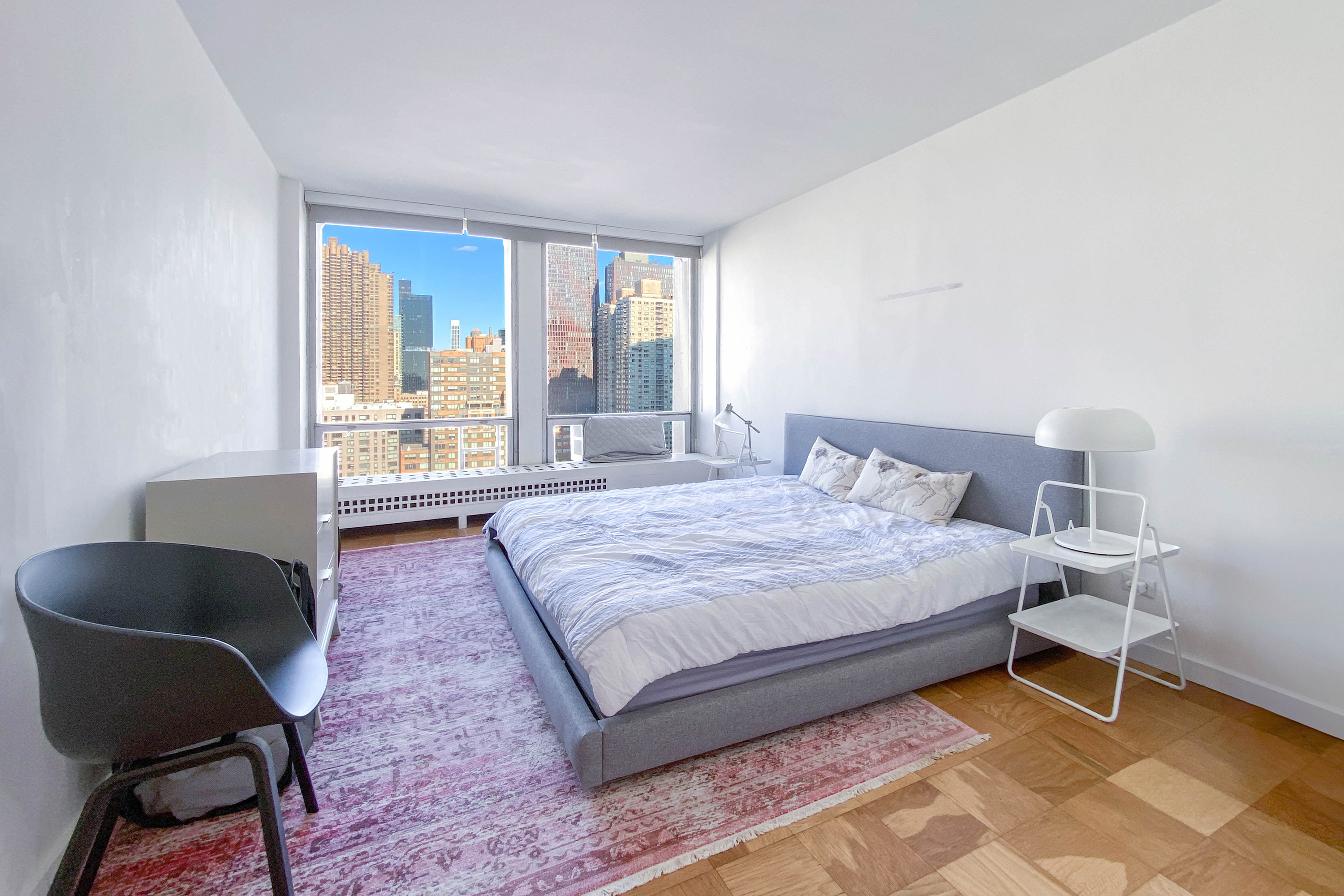 343 East 30th Street, Unit 18A Manhattan, NY 10016 - Photo 7 of 17 a bedroom with a bed chair and window