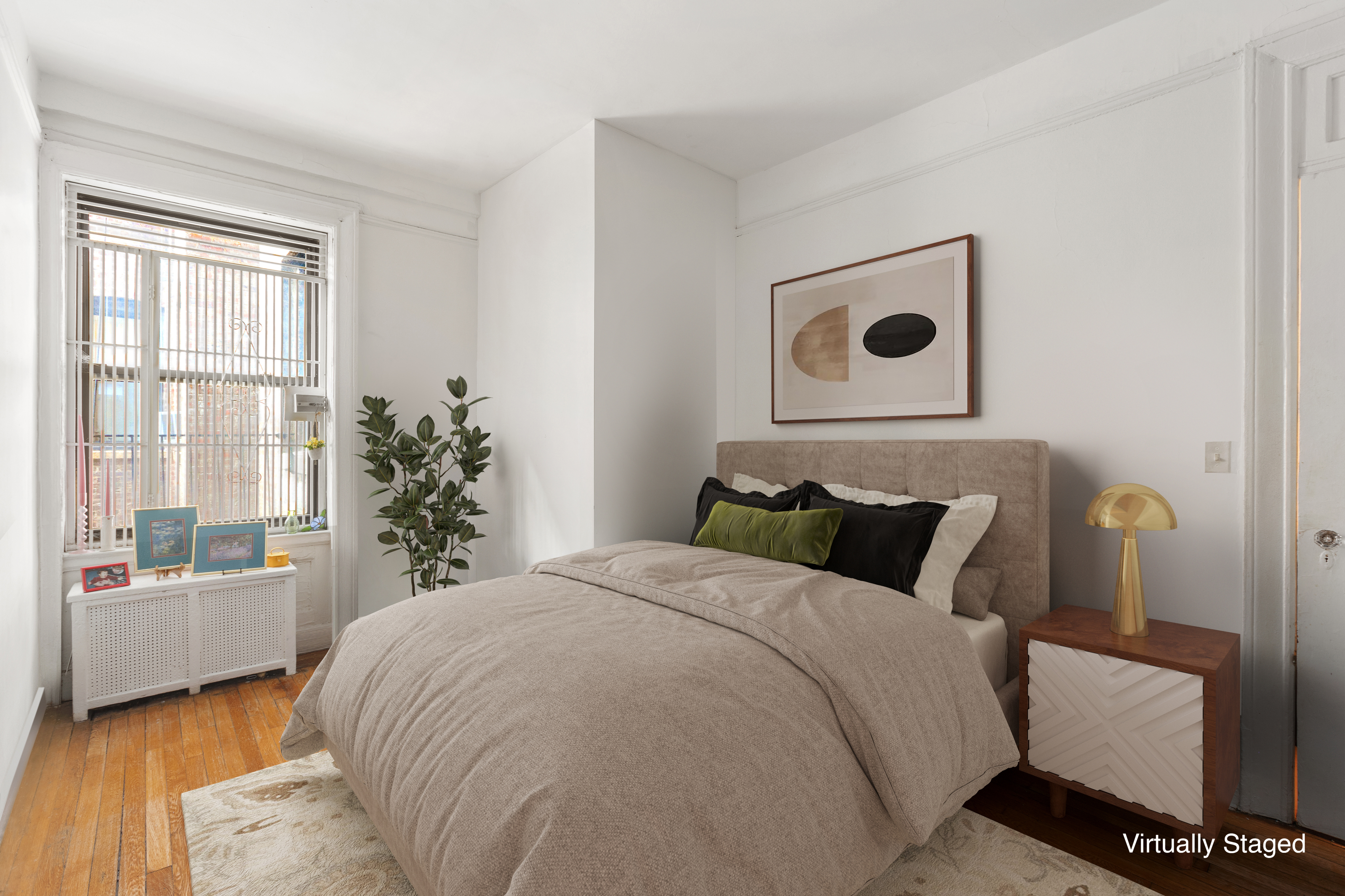 510 West 110th Street, Unit 2E Manhattan, NY 10025 - Photo 5 of 13 a bedroom with a bed and a large window