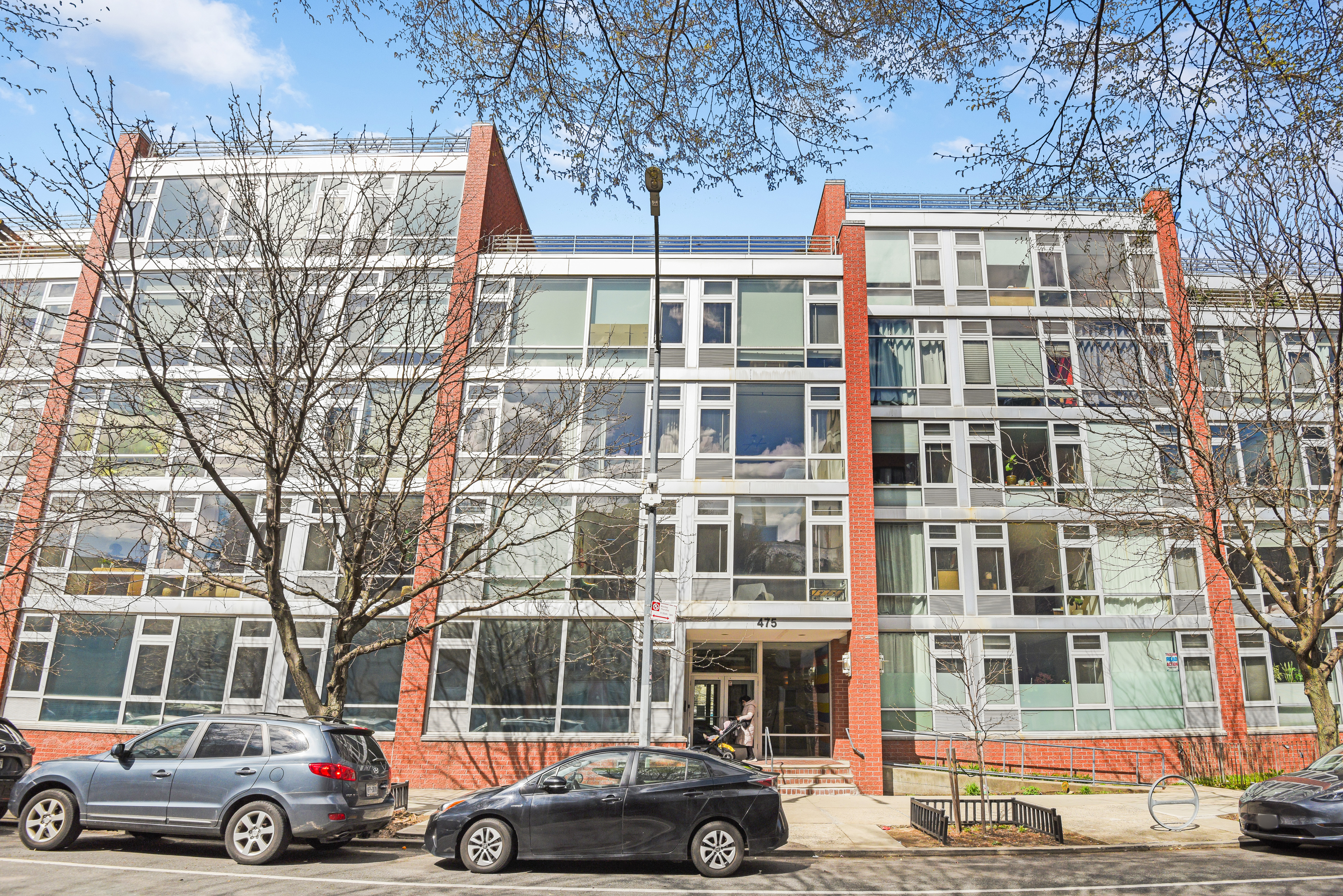 475 Sterling Place, Unit 3A Brooklyn, NY 11238 - Photo 6 of 23 a front view of a building with parking space
