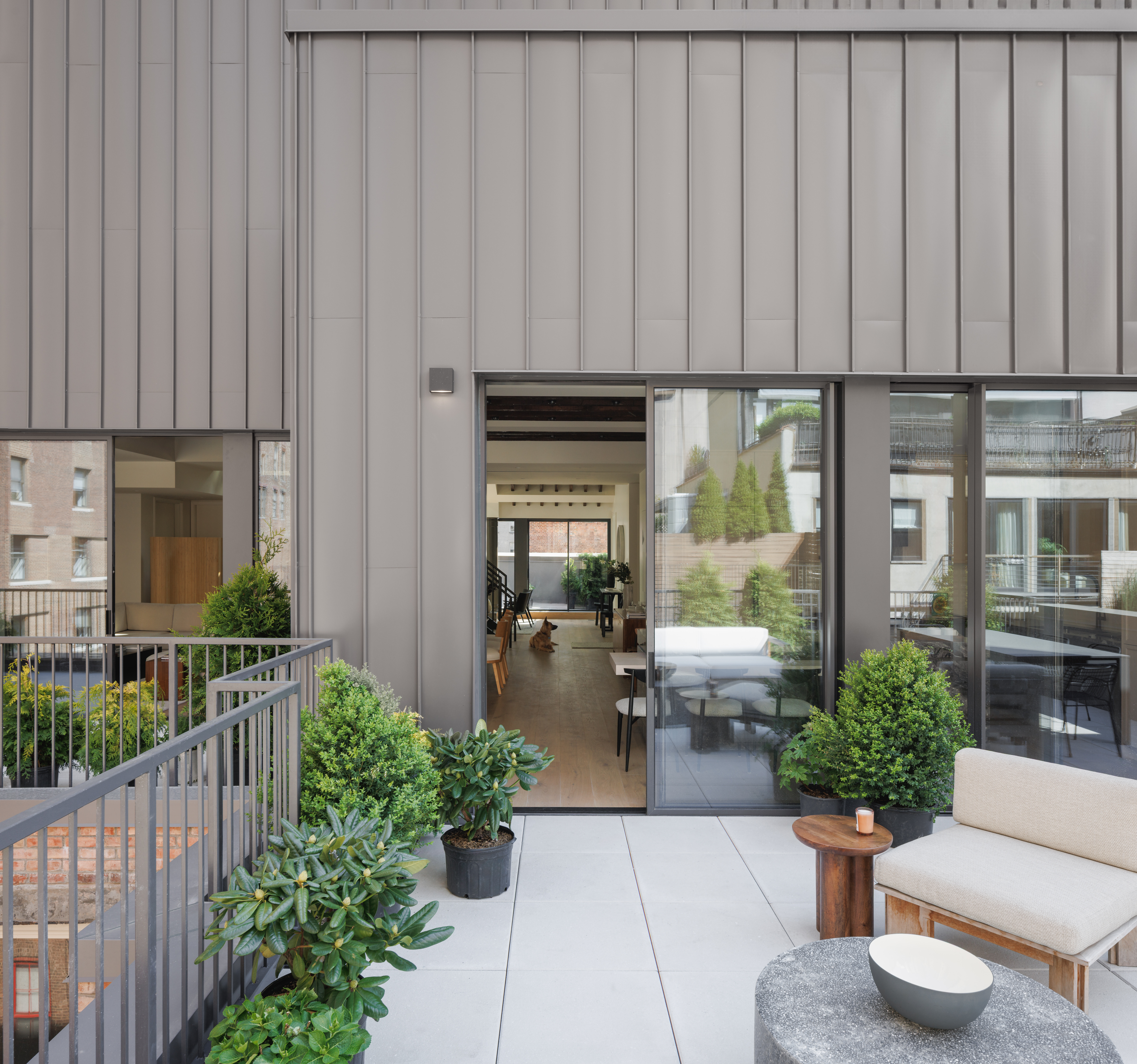 62 Reade Street, Unit PH Manhattan, NY 10007 - Photo 13 of 14 a view of a porch with chairs and potted plants