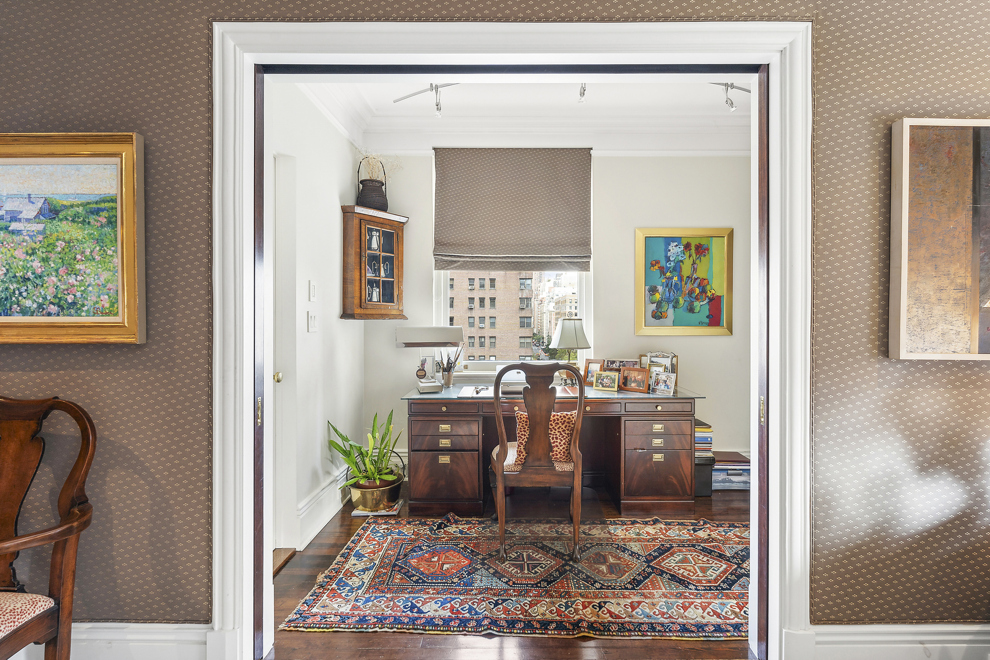 31 East 79th Street, Unit 10E Manhattan, NY 10075 - Photo 5 of 11 a view of living room and window