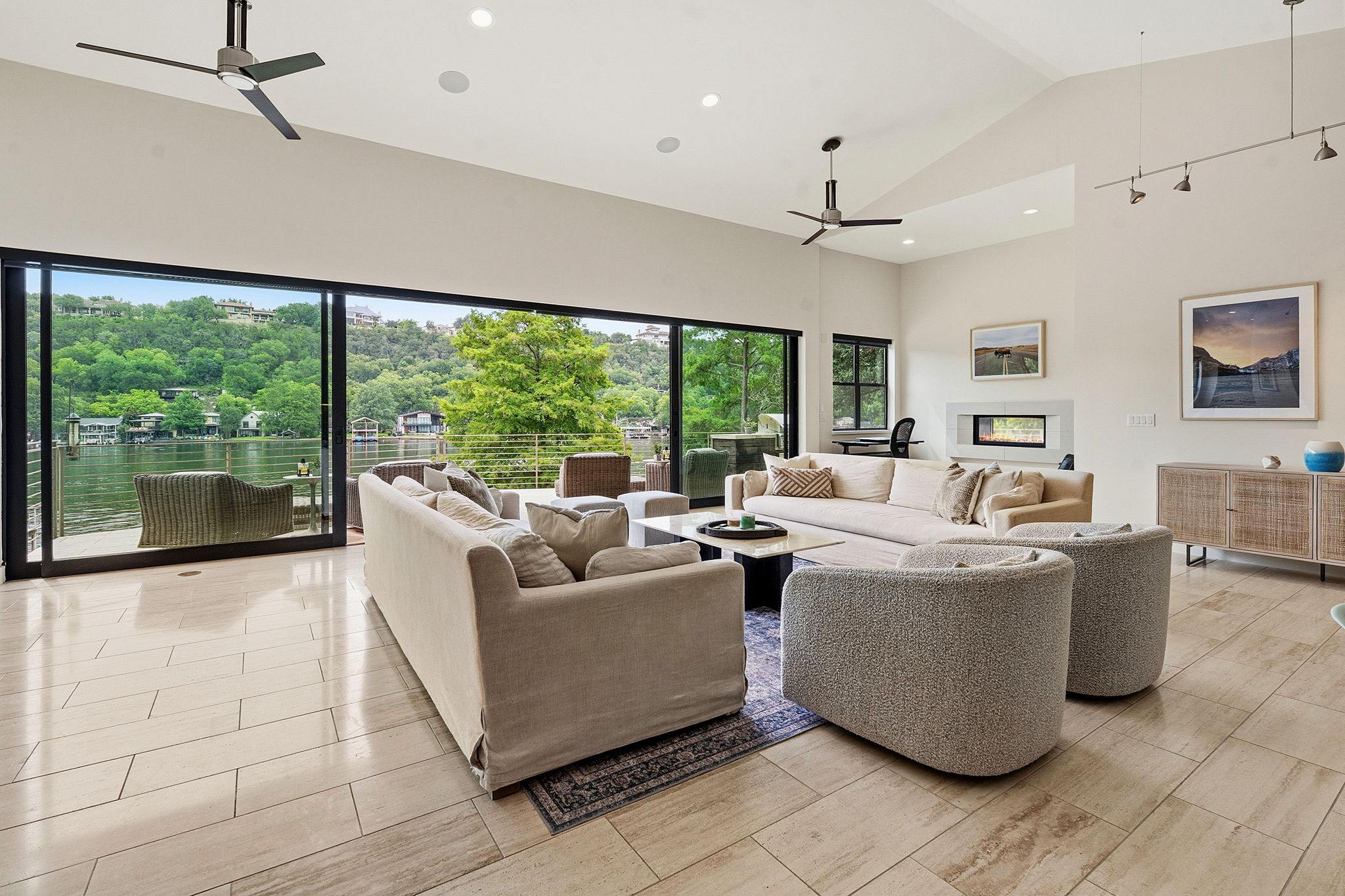 3605 Robbins Road Austin, TX 78730 - Photo 6 of 51 a living room with fireplace furniture and a large window