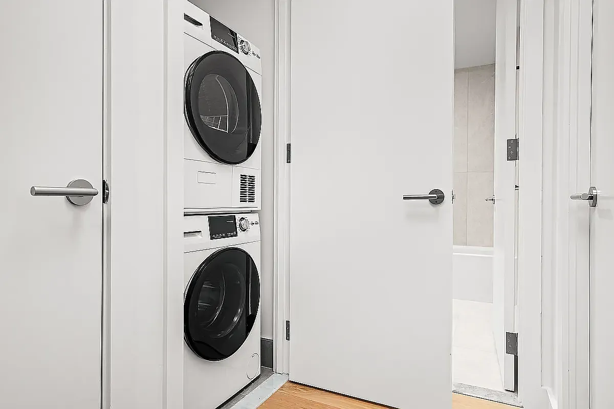 130 2nd Street, Unit 9B Brooklyn, NY 11231 - Photo 8 of 19 a utility room with dryer and washer