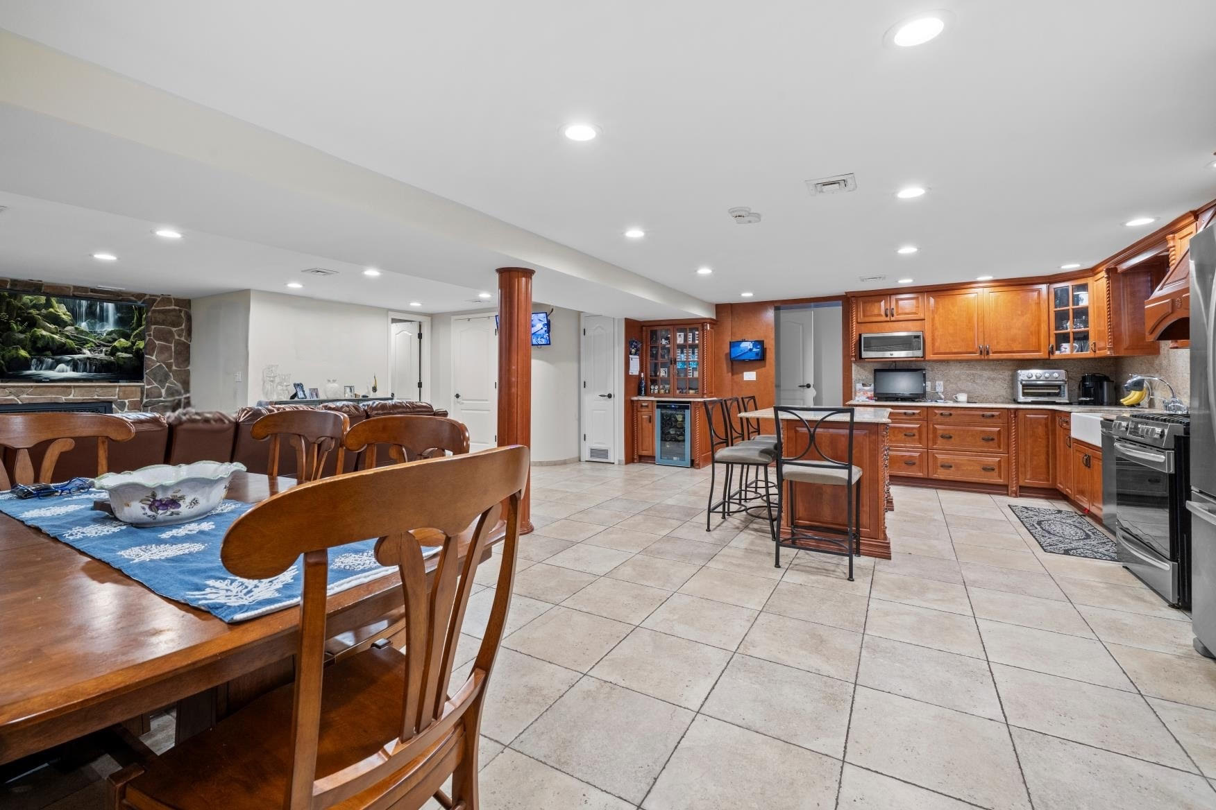2253 East 64th Street Brooklyn, NY 11234 - Photo 30 of 45 a living room with stainless steel appliances furniture and kitchen view