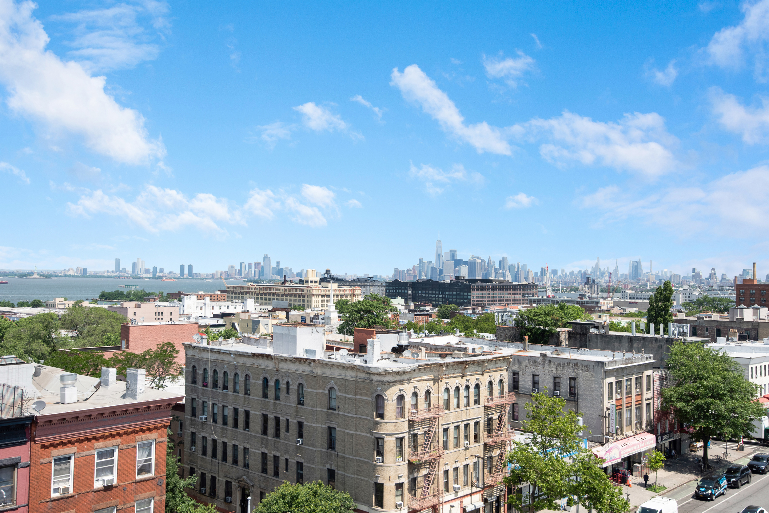 4907 4th Avenue, Unit 7A Brooklyn, NY 11220 - Photo 2 of 13 a view of a lake with a city