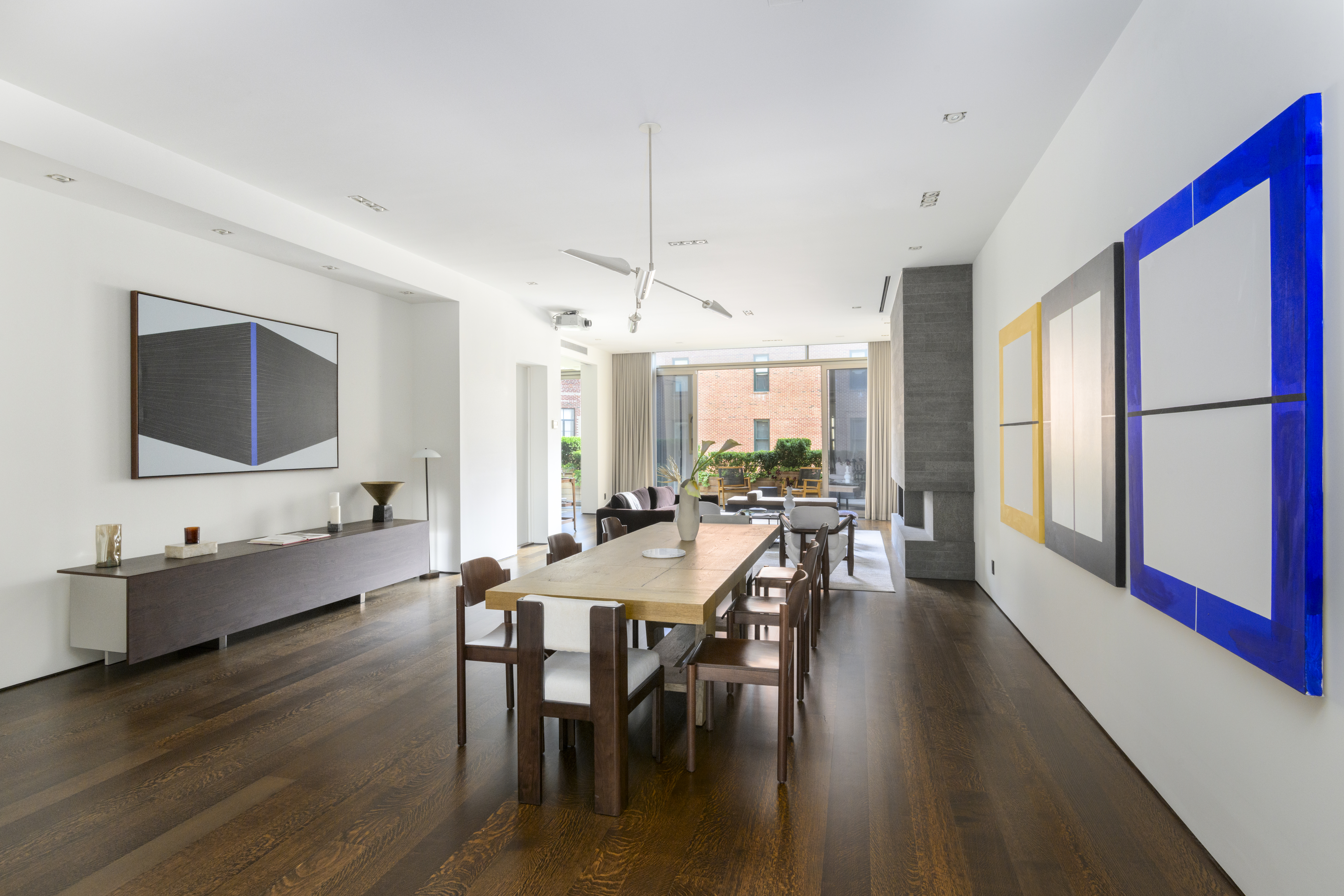 33 Vestry Street Manhattan, NY 10013 - Photo 2 of 16 a view of a dining room with furniture window and wooden floor