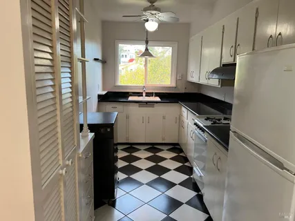 a view of a street with some trees