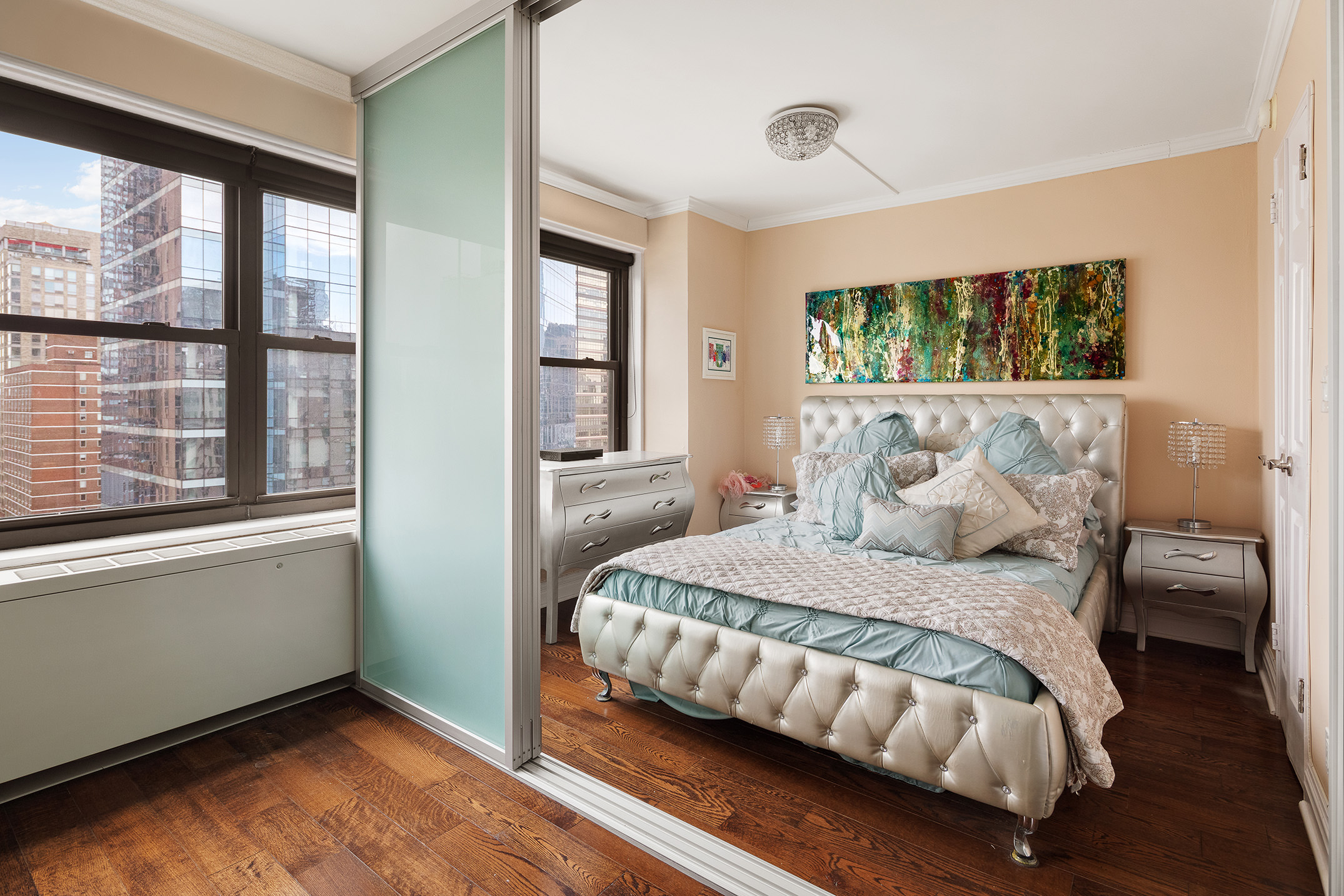 160 West End Avenue, Unit 25C Manhattan, NY 10023 - Photo 3 of 6 a bedroom with a bed and a window