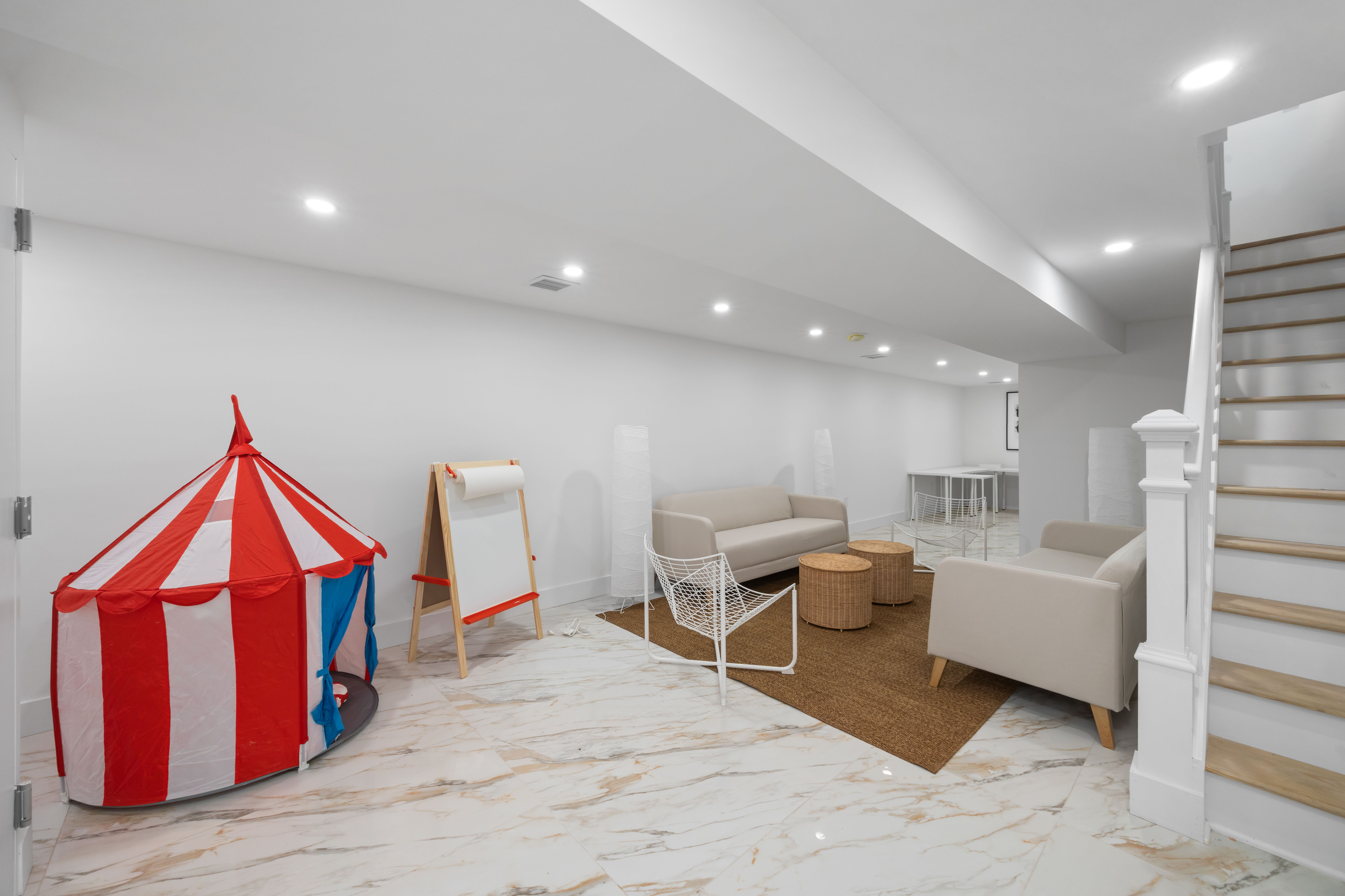 1000 Putnam Avenue Brooklyn, NY 11221 - Photo 11 of 17 a room with furniture and stairs