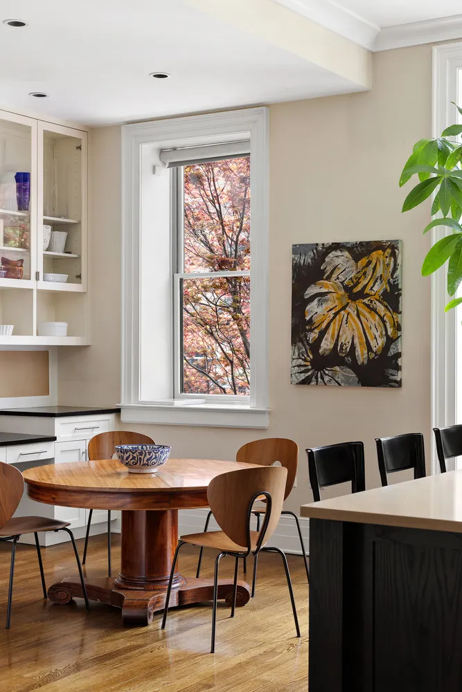 a workspace with furniture and window