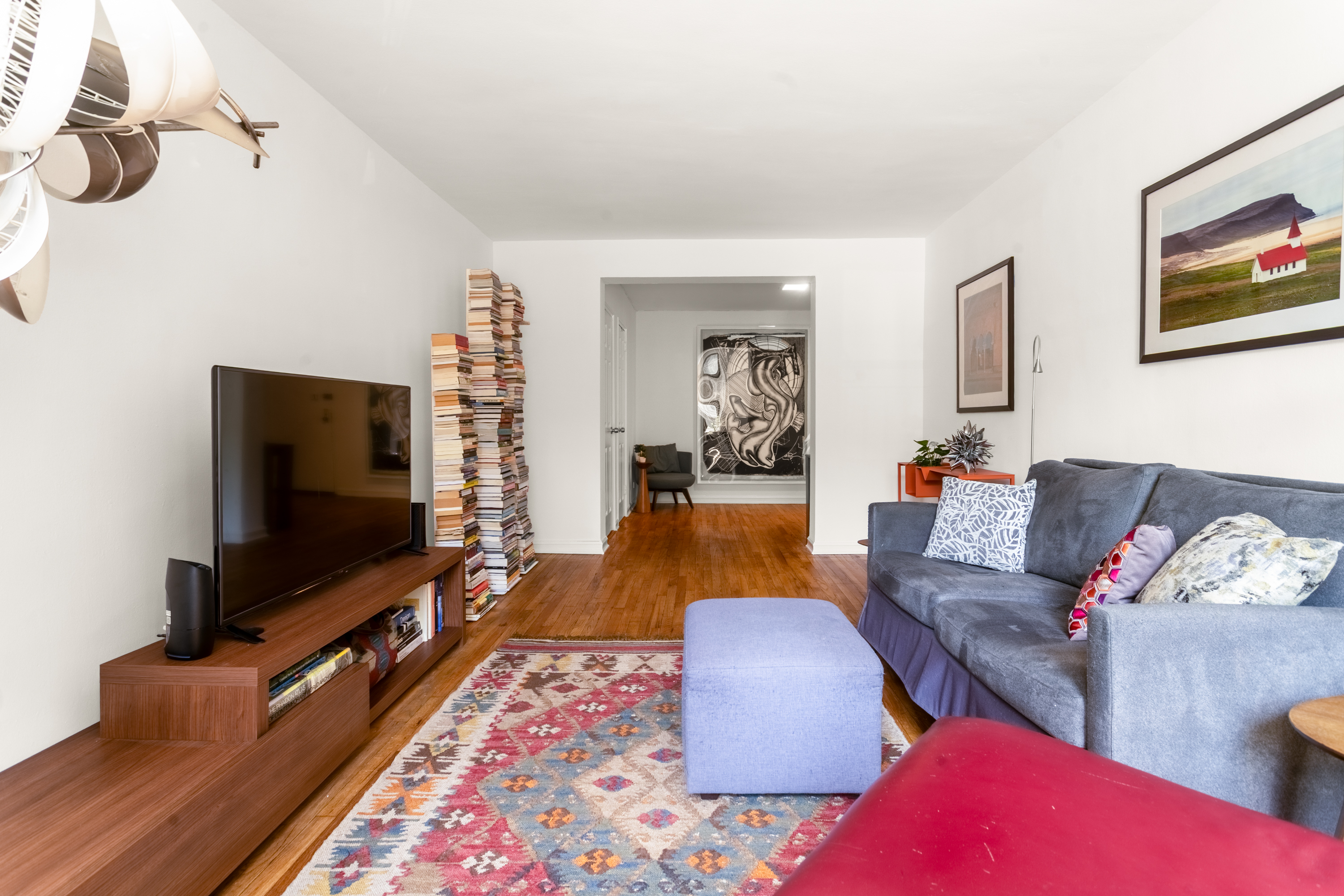 340 Haven Avenue, Unit 2H Manhattan, NY 10033 - Photo 2 of 24 a living room with furniture and a flat screen tv