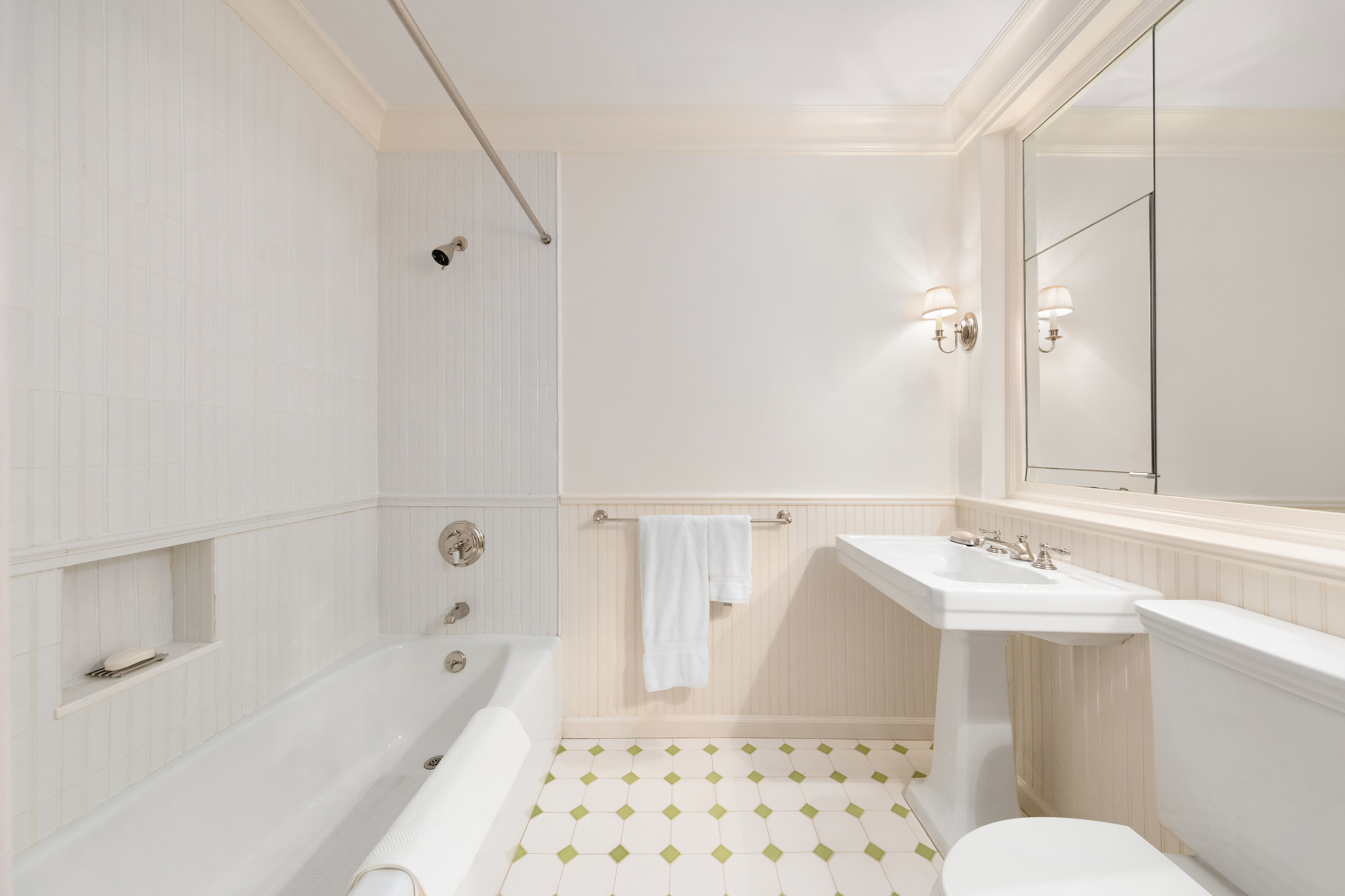 14 Sutton Place South, Unit PHA Manhattan, NY 10022 - Photo 17 of 22 a bathroom with a sink and a mirror