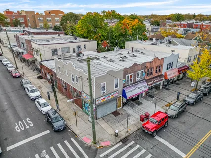 a view of city from balcony with seating space