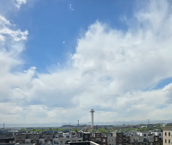 a view of a city with lots of green space