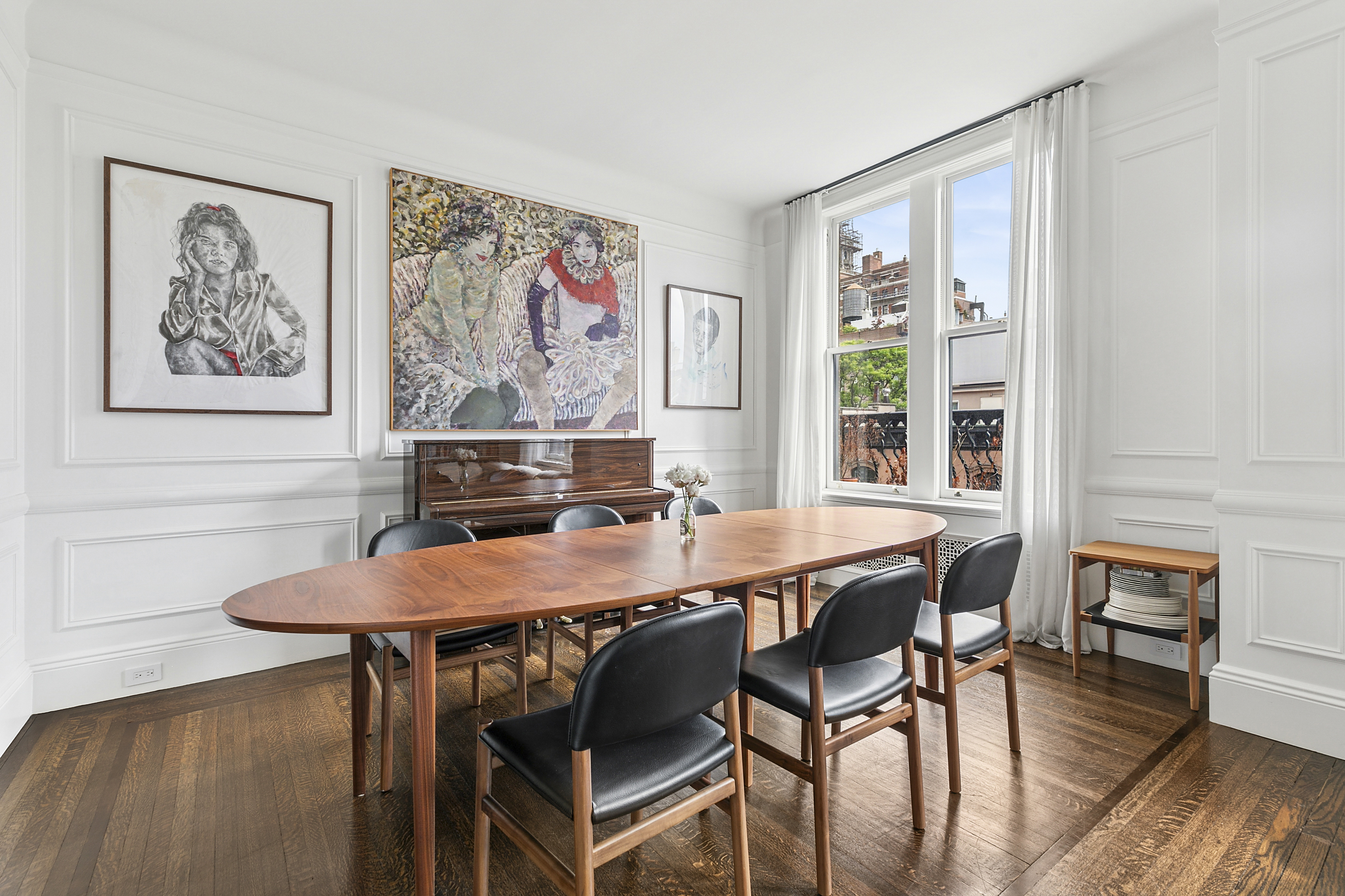 31 West 12th Street, Unit 5E Manhattan, NY 10011 - Photo 3 of 14 a view of a dining room with furniture and wooden floor