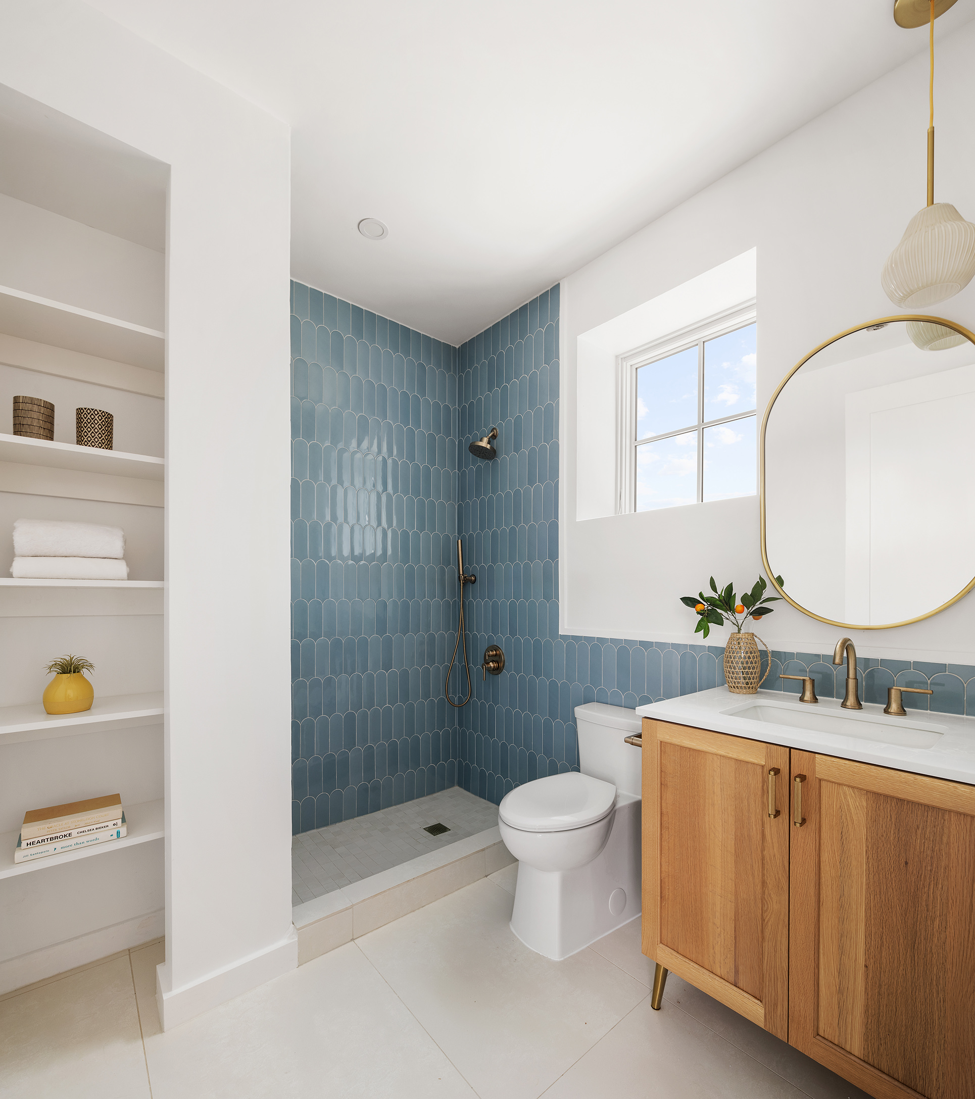 262 17th Street, Unit PH Brooklyn, NY 11215 - Photo 12 of 15 a bathroom with a sink a toilet and shower