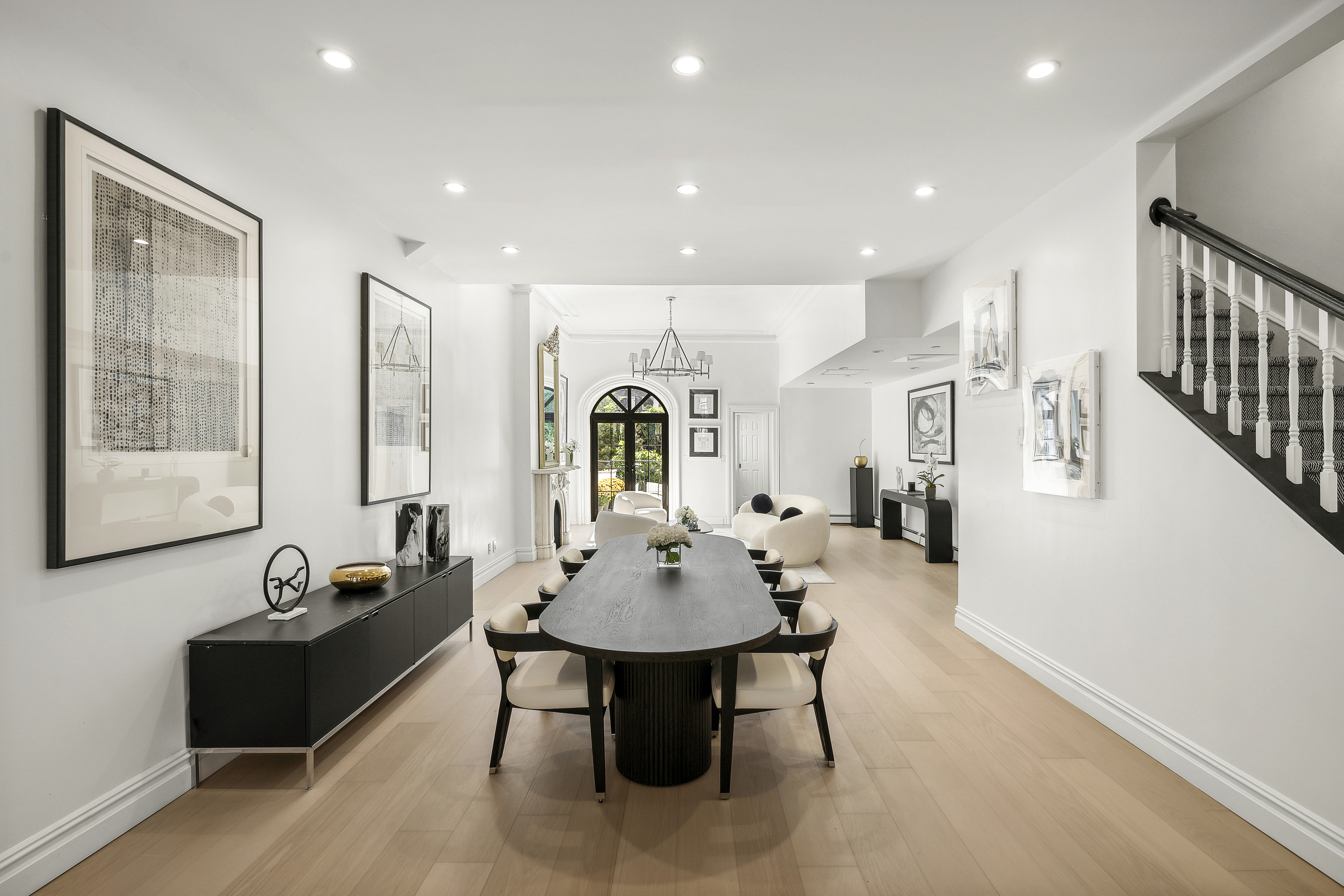 222 East 61st Street Manhattan, NY 10065 - Photo 11 of 32 a living room with furniture a window and a table