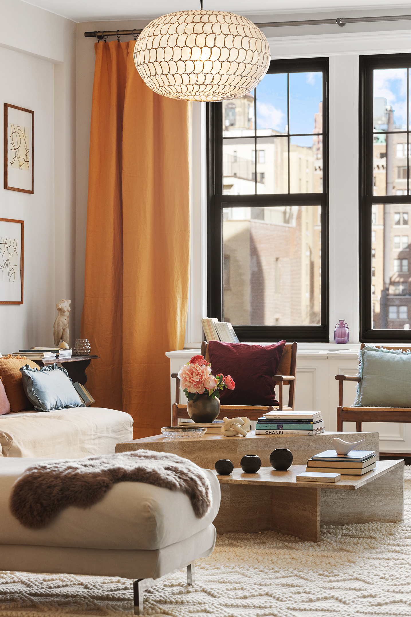 24 West 69th Street, Unit 9A Manhattan, NY 10023 - Photo 5 of 14 a bedroom with furniture and a large window