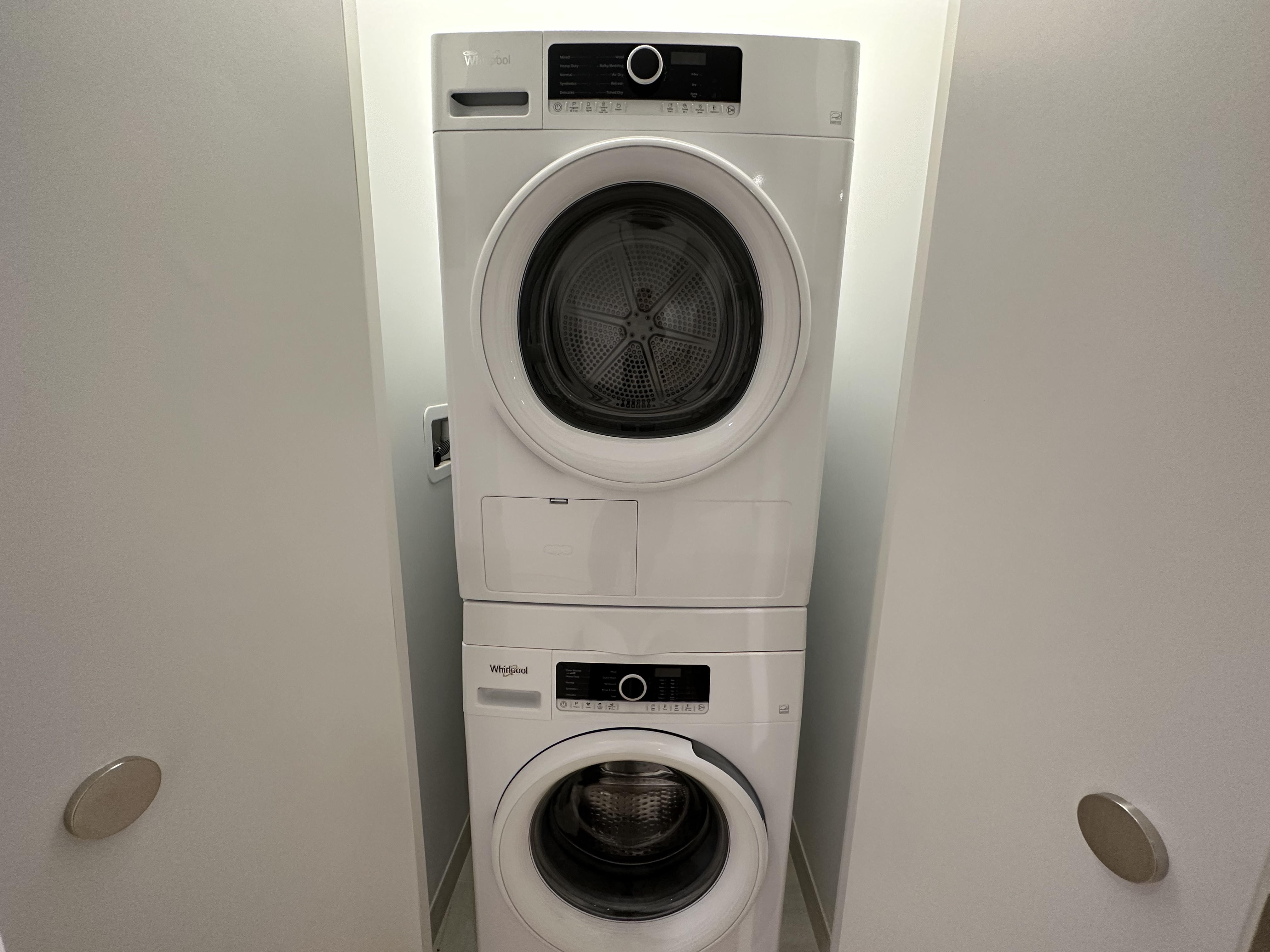 1 Wall Street, Unit 915 Manhattan, NY 10005 - Photo 8 of 18 a close up view of a washer and dryer