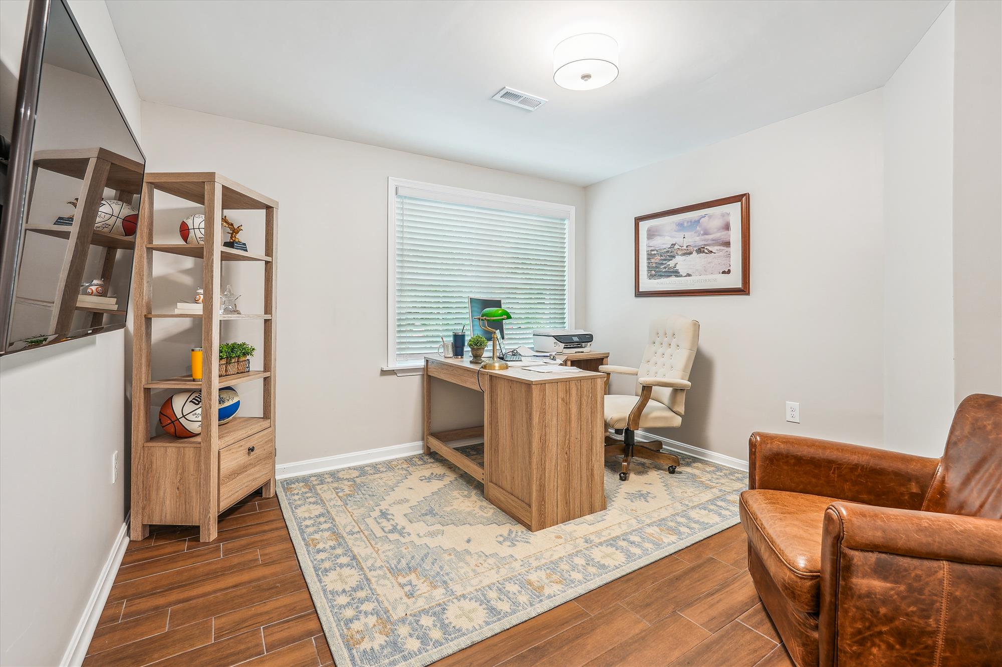 9904 Carter Road Bethesda, MD 20817 - Photo 33 of 41 a living room with furniture and a wooden floor