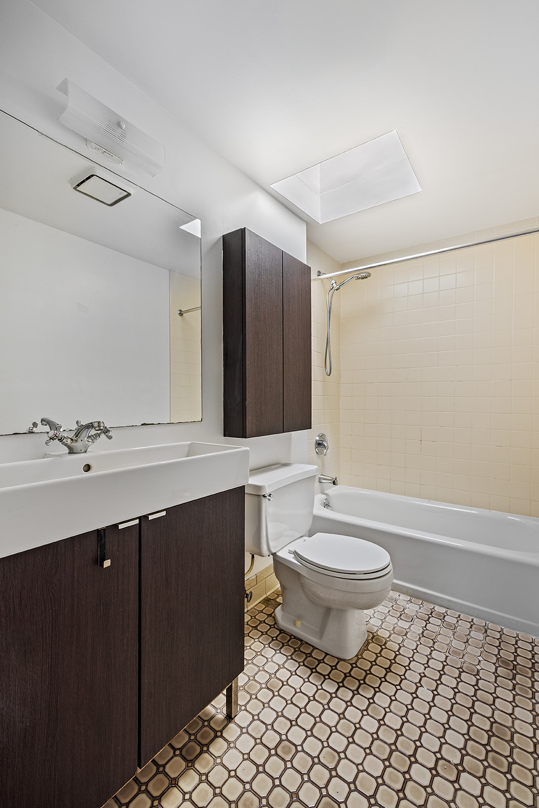 44 Butler Street Brooklyn, NY 11231 - Photo 17 of 22 a bathroom with a sink toilet a mirror and shower
