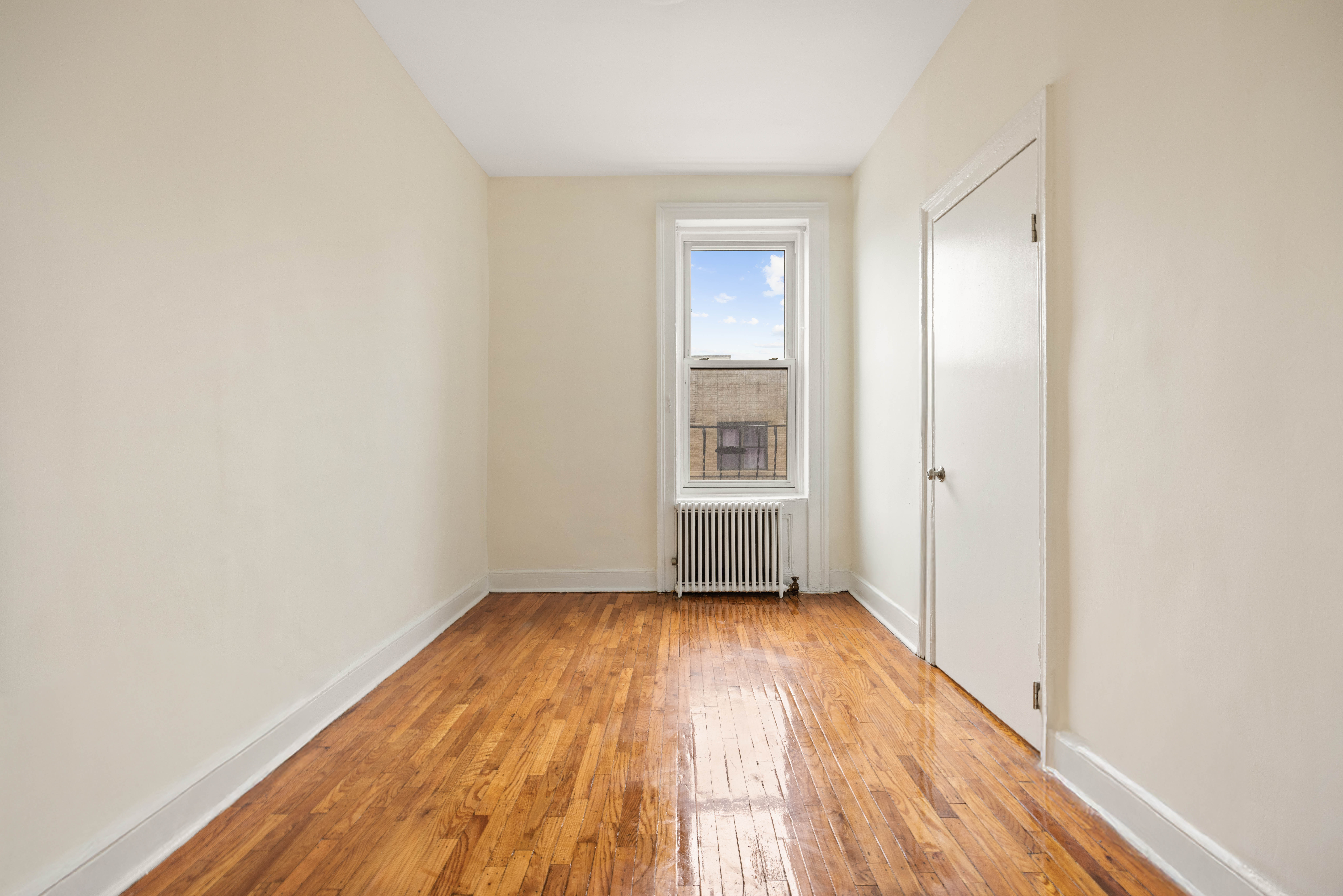 497 5th Avenue, Unit 3 Brooklyn, NY 11215 - Photo 3 of 5 wooden floor in a empty room