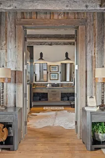 a kitchen with stainless steel appliances a sink and a stove