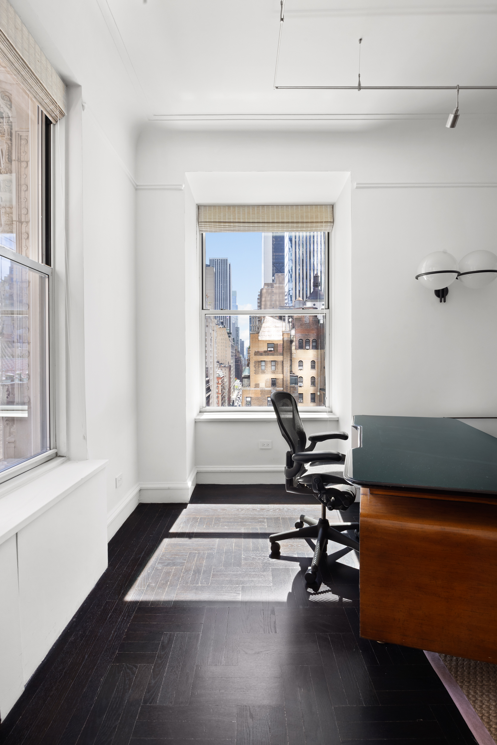 180 West 58th Street, Unit 11A Manhattan, NY 10019 - Photo 4 of 17 a living room with furniture