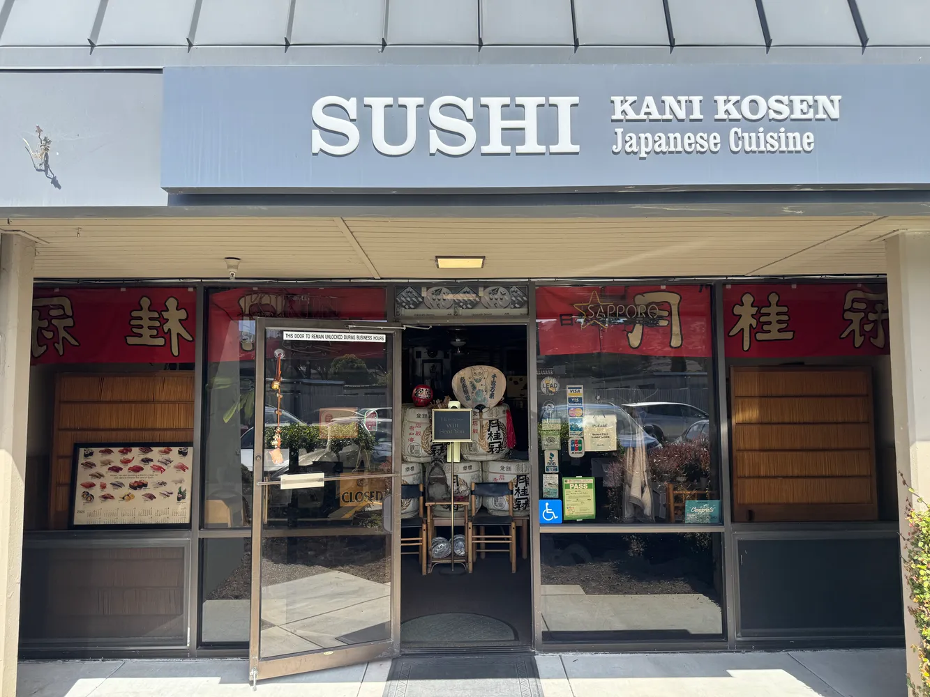 a living room with furniture and a large mirror