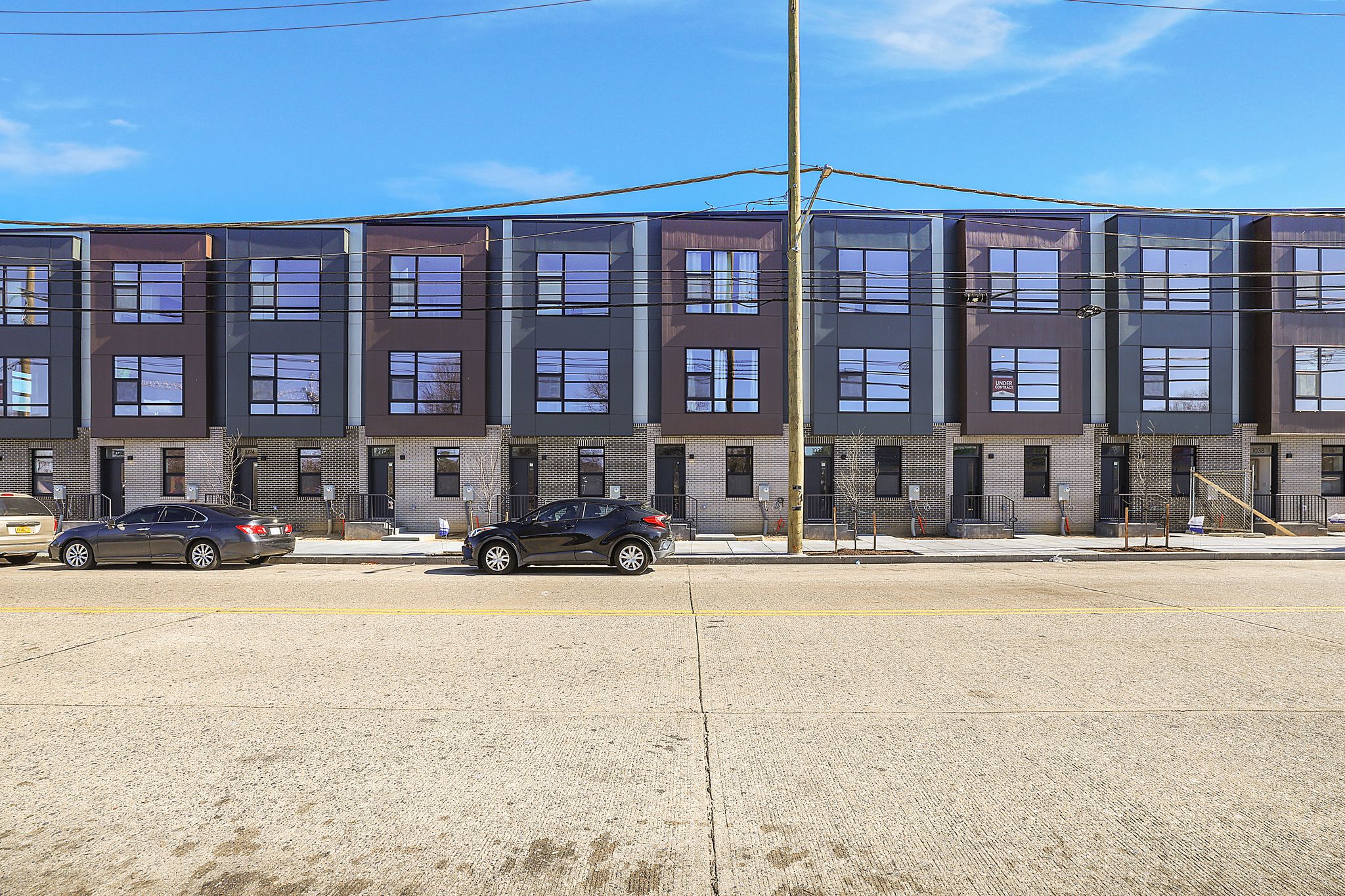 a front view of a building with street view