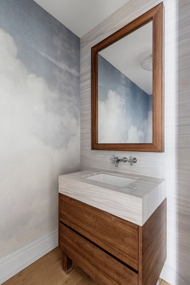 344 West 72nd Street, Unit 1008 Manhattan, NY 10023 - Photo 19 of 35 a bathroom with a sink and a mirror