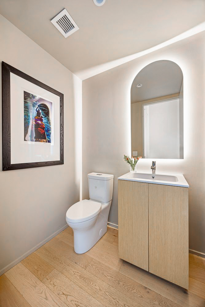 168 Plymouth Street, Unit PHC Brooklyn, NY 11201 - Photo 14 of 19 a bathroom with a toilet sink and mirror