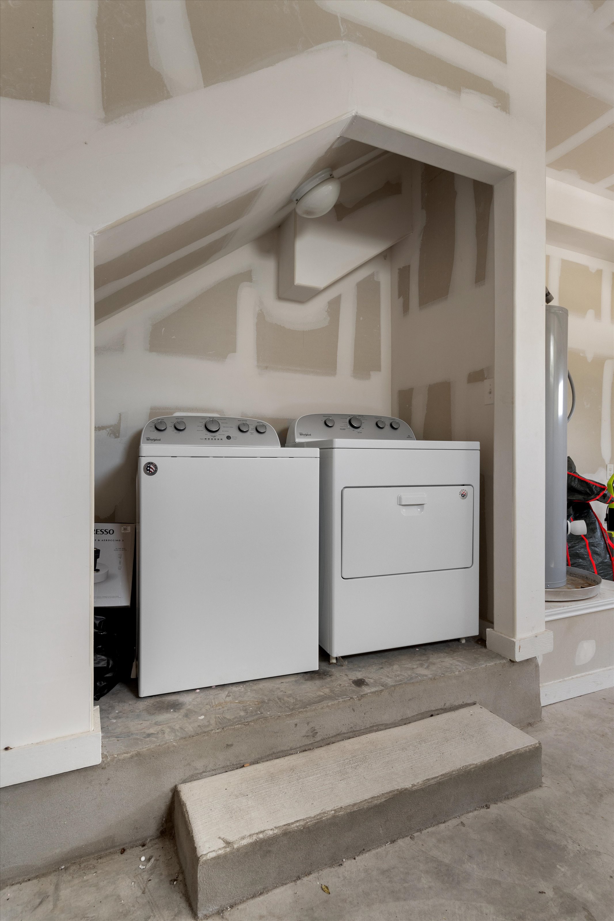4330 Olenick Street Austin, TX 78723 - Photo 17 of 29 a utility room with dryer and washer