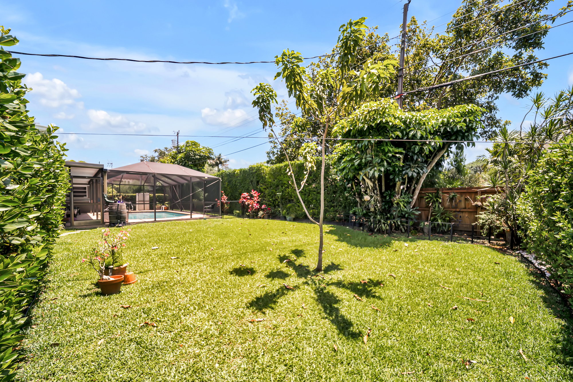 6760 Southwest 62nd Terrace Miami, FL 33143 - Photo 21 of 38 a swimming pool with yard
