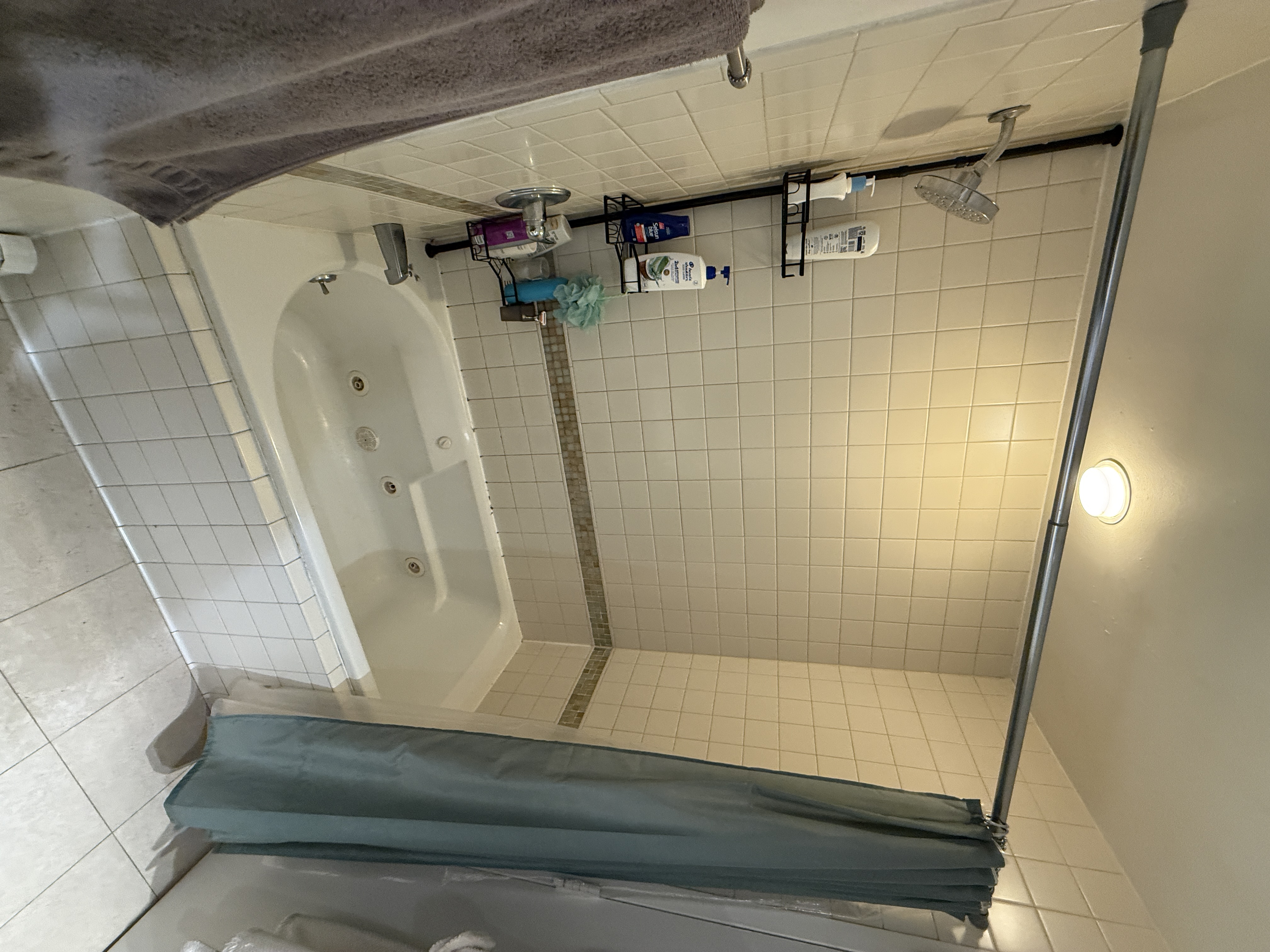 101 Prospect Park Southwest, Unit 3B Brooklyn, NY 11218 - Photo 12 of 23 a bathroom with a bathtub and a shower