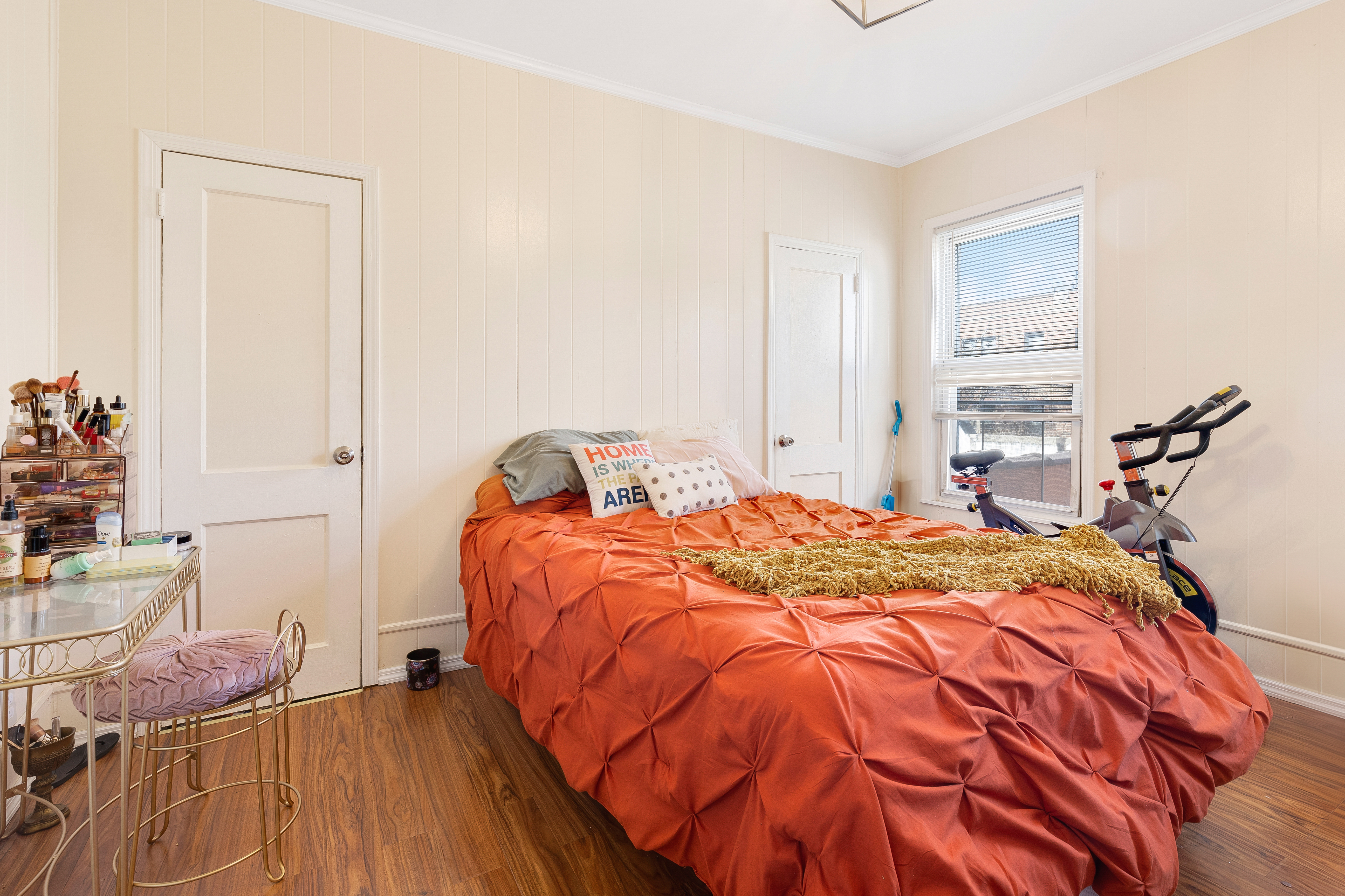 35-47 30th Street Queens, NY 11106 - Photo 8 of 14 a bedroom with a bed and wooden floor