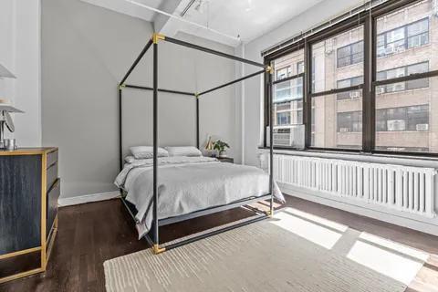 a bathroom with a bathtub and a sink