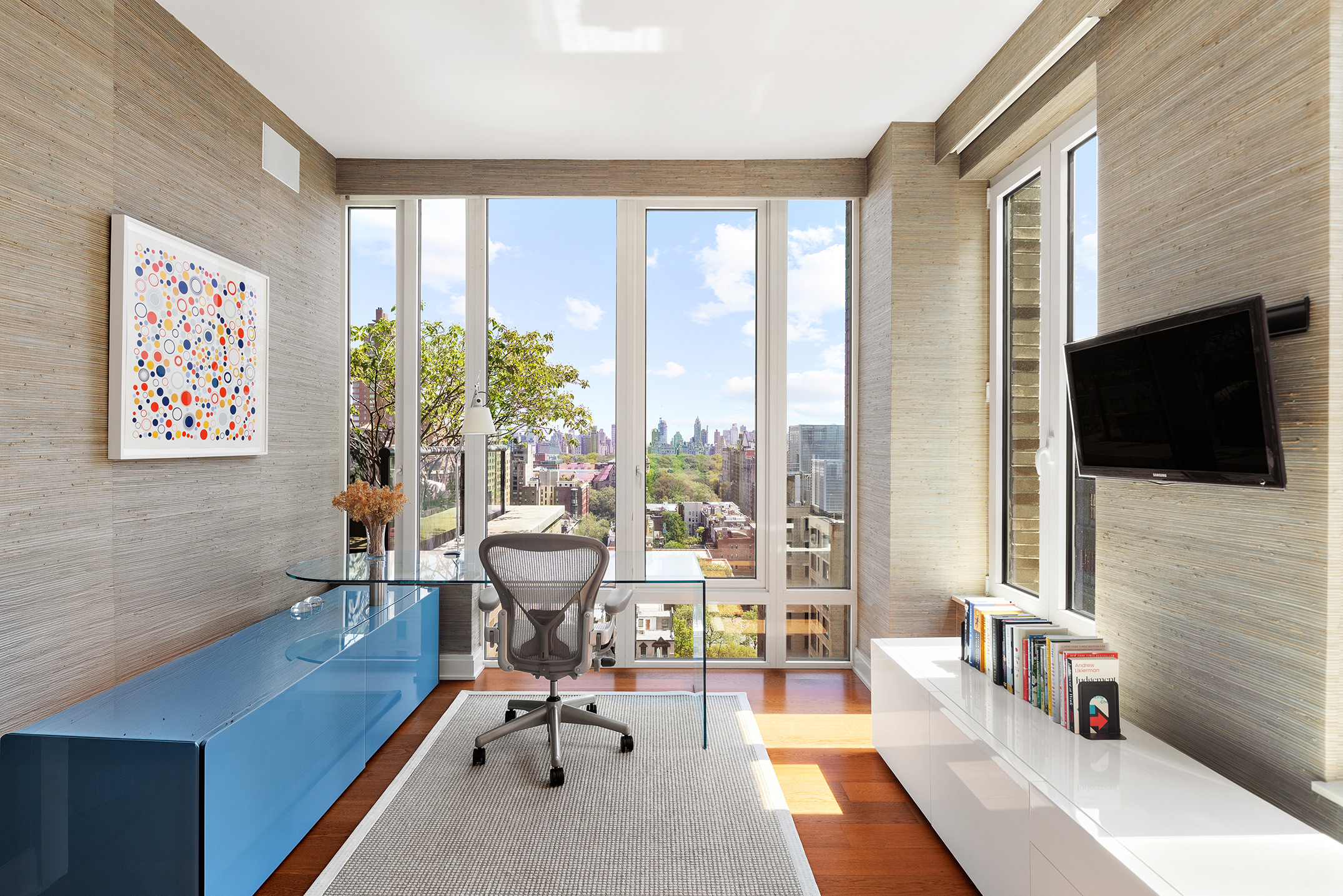 230 West 78th Street, Unit PH19 Manhattan, NY 10024 - Photo 12 of 17 a living room with furniture tv and a flat screen tv