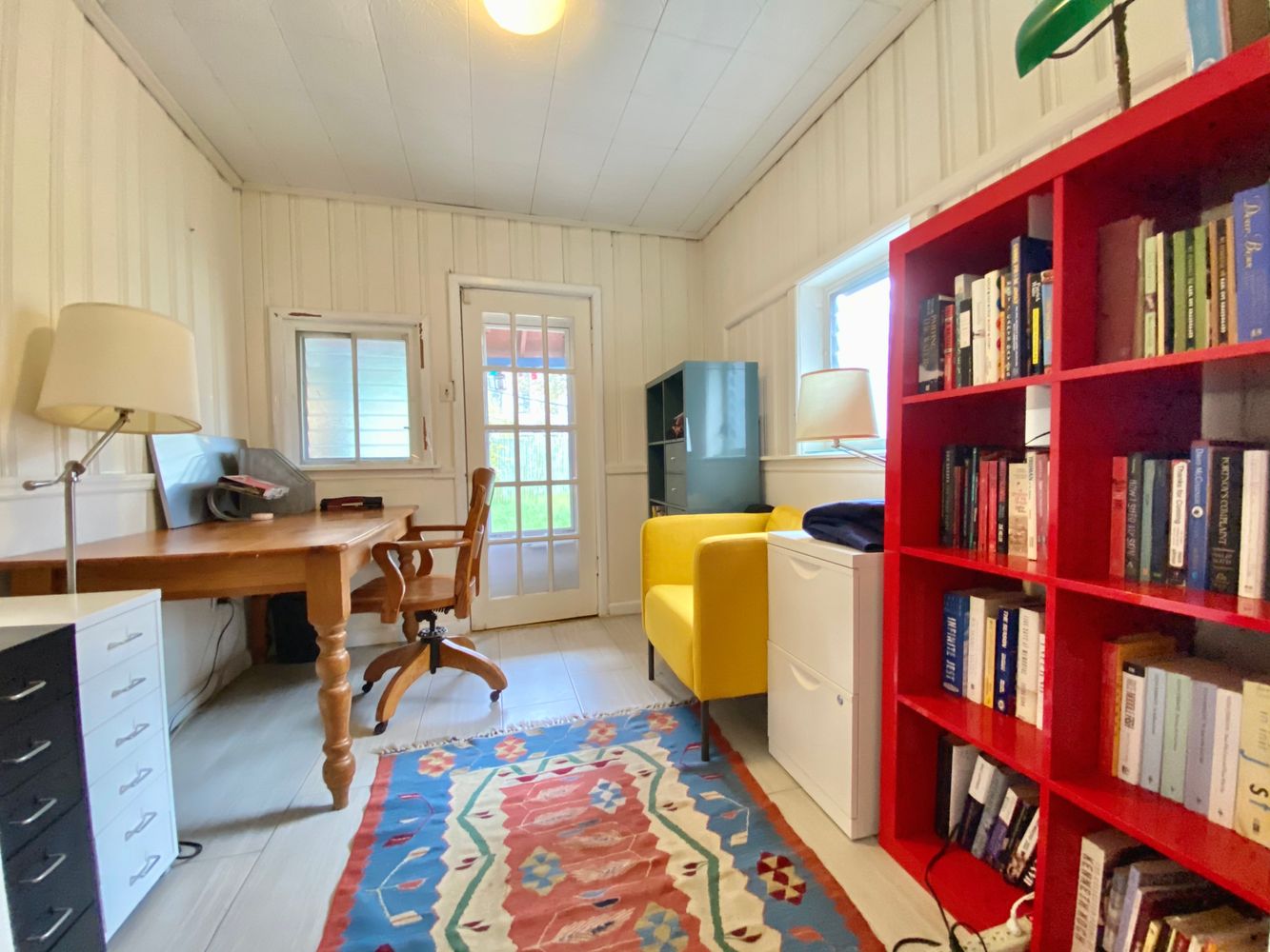 390 5th Street, Unit 1 Brooklyn, NY 11215 - Photo 12 of 15 a view of a livingroom with workspace and a bookshelf