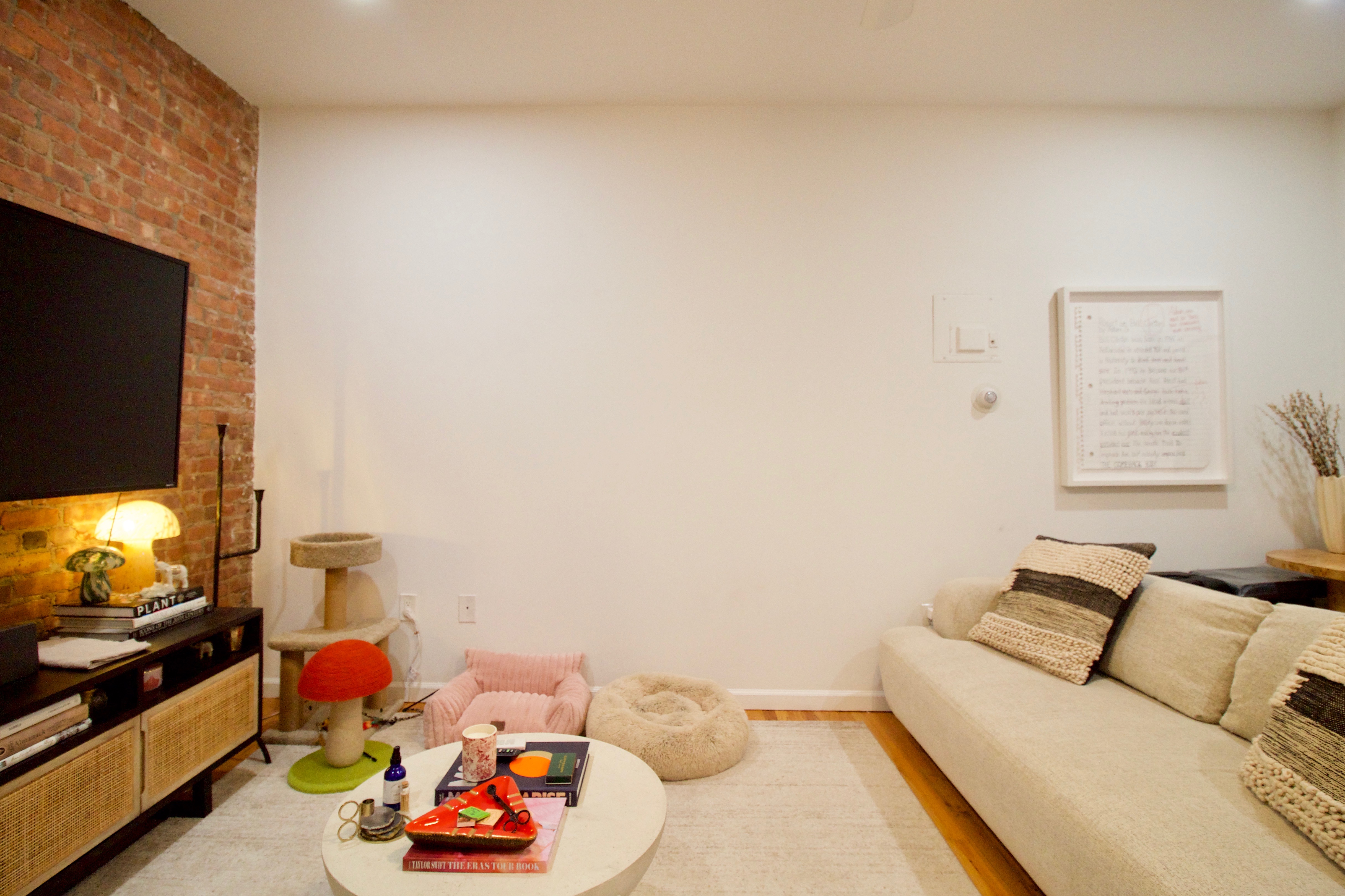 134 Union Street, Unit 2R Brooklyn, NY 11231 - Photo 23 of 23 a living room with furniture and a flat screen tv