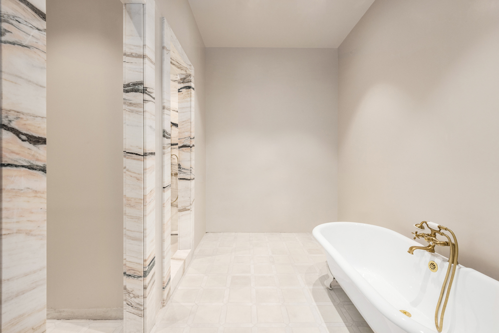33 West 74th Street, Unit 2 Manhattan, NY 10023 - Photo 11 of 15 a bathroom with a bathtub and shower