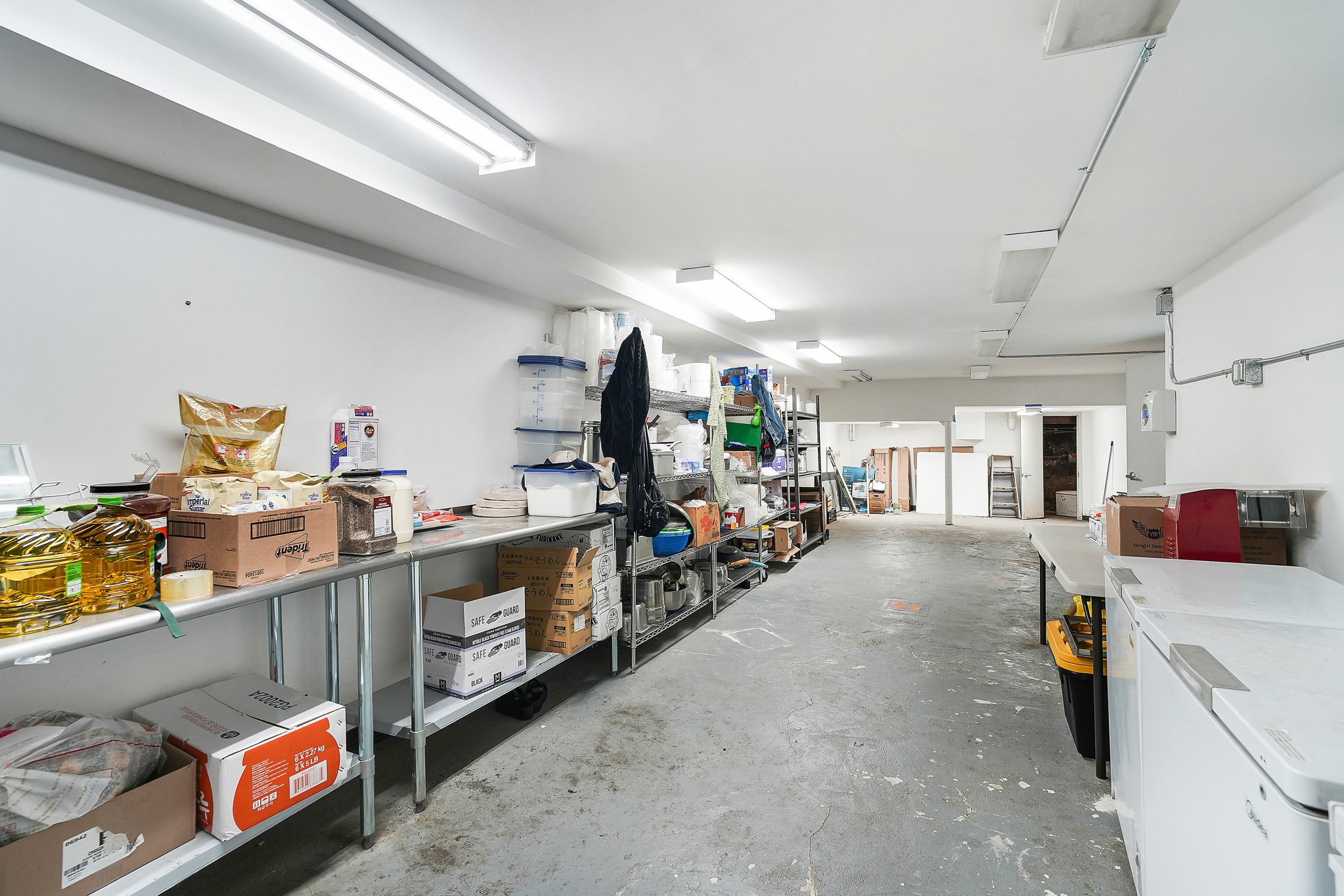 24 Beaver Street Manhattan, NY 10004 - Photo 6 of 25 a room with storage and utility