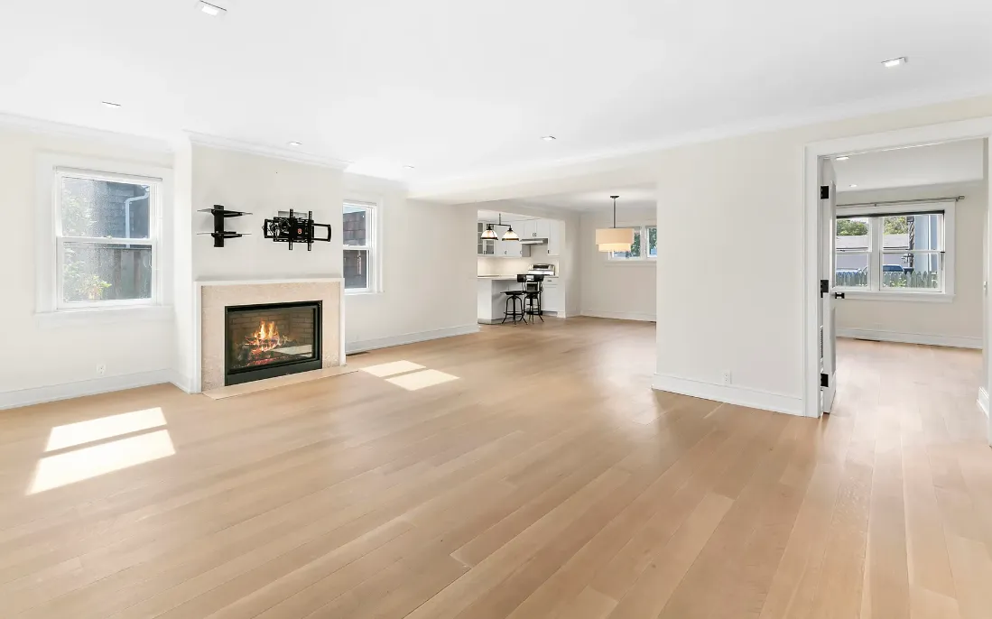 a kitchen with a center island and stainless steel appliances