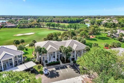 an aerial view of a house with garden space and outdoor space