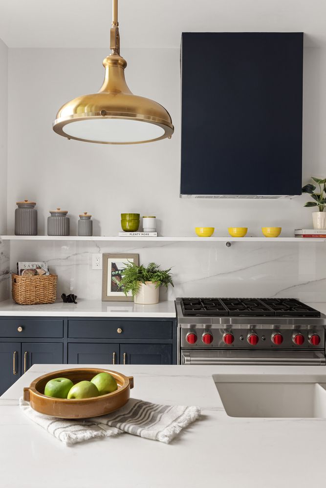 a kitchen with a sink and a stove