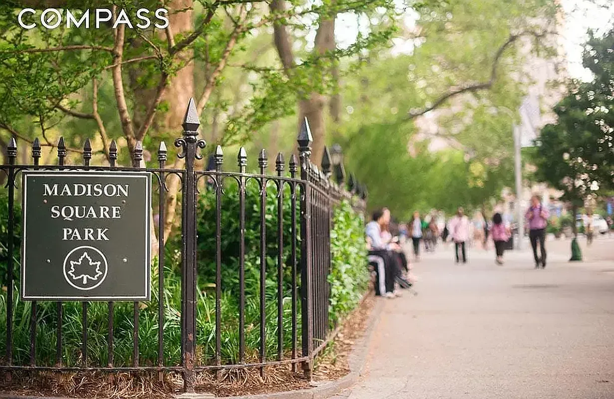 a group of people walking down a street