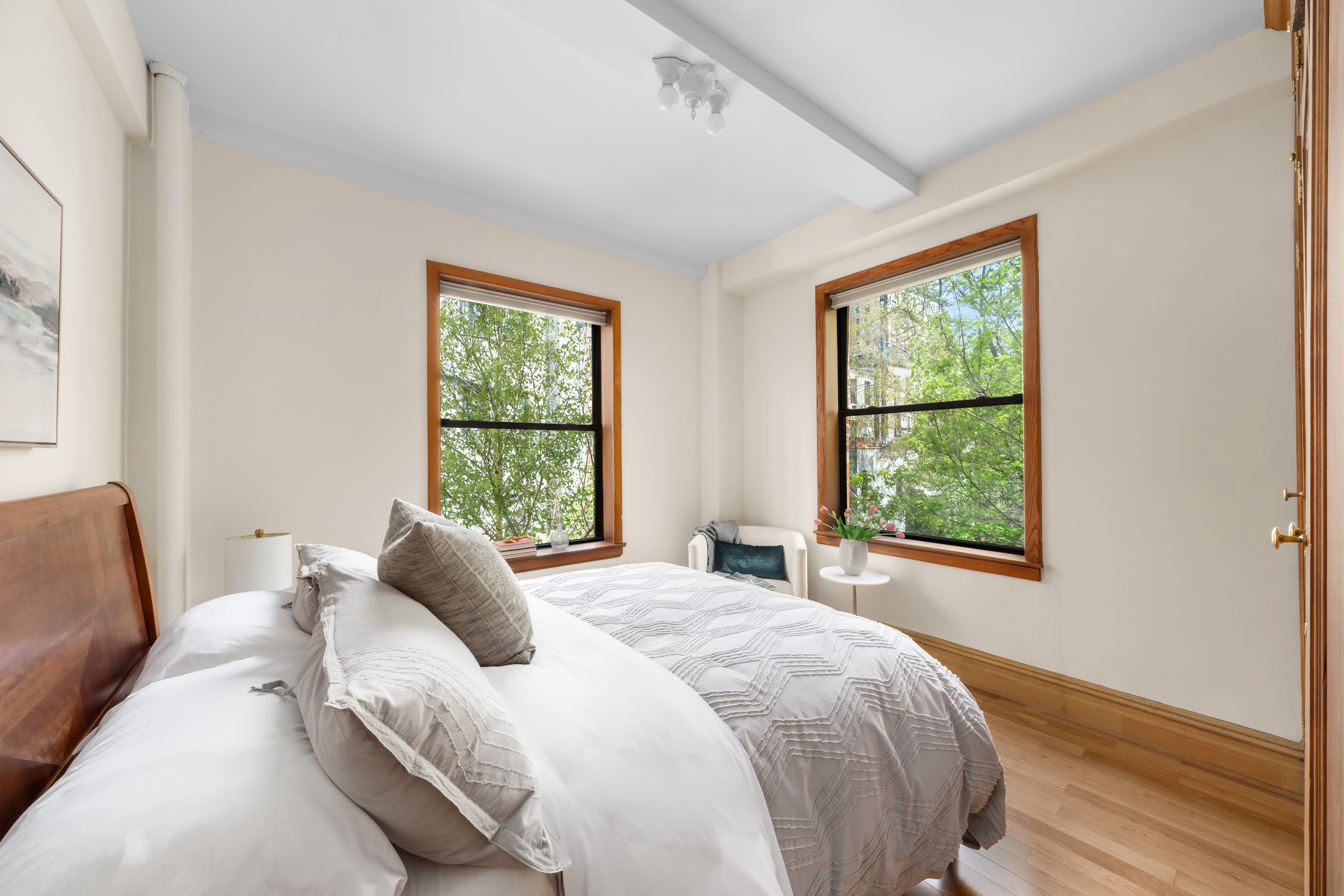 35 West 82nd Street, Unit 4C Manhattan, NY 10024 - Photo 6 of 11 a bedroom with a bed and a window